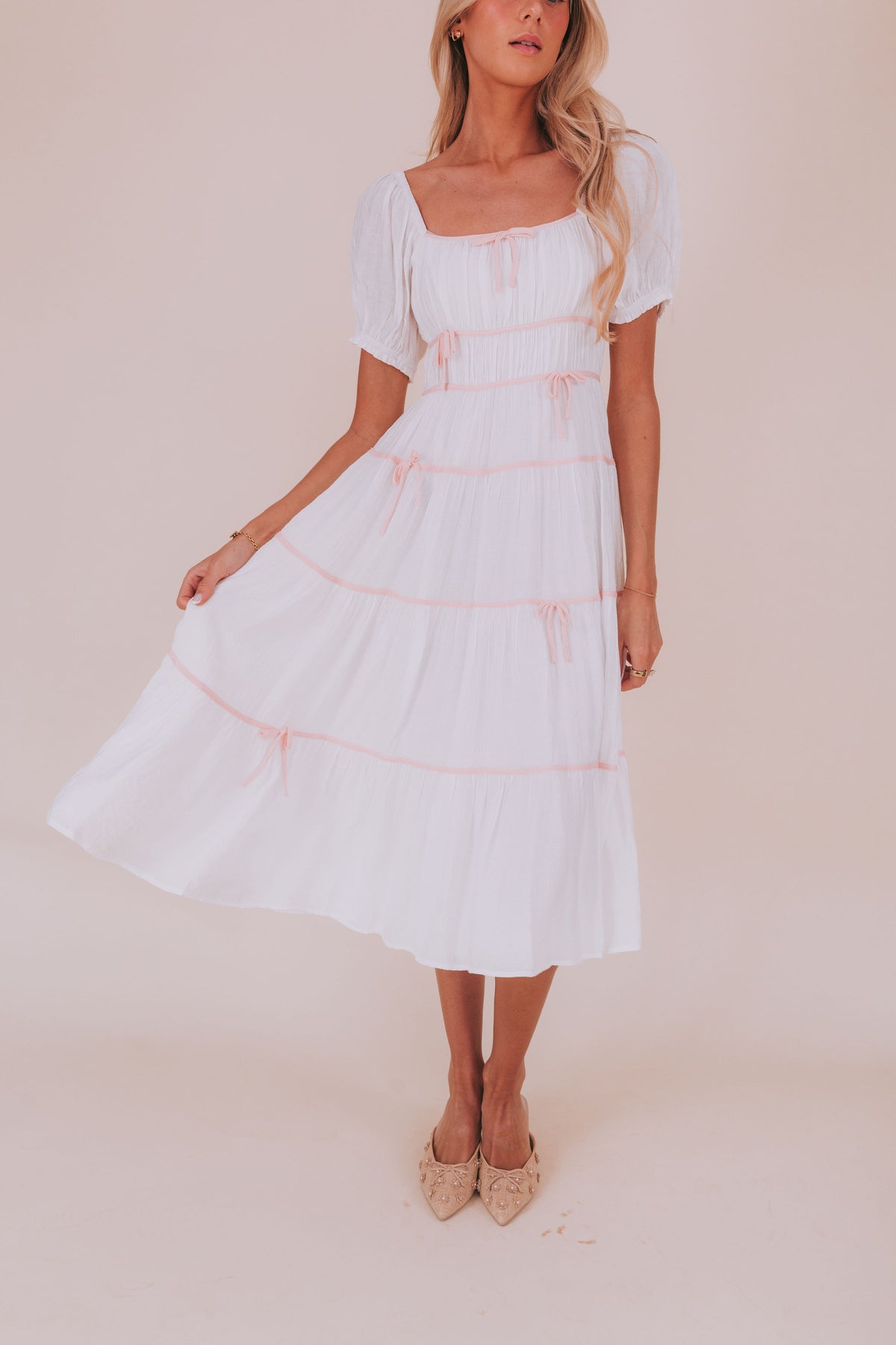 Maxi midi dress with piped details puff sleeves square neckline bow details