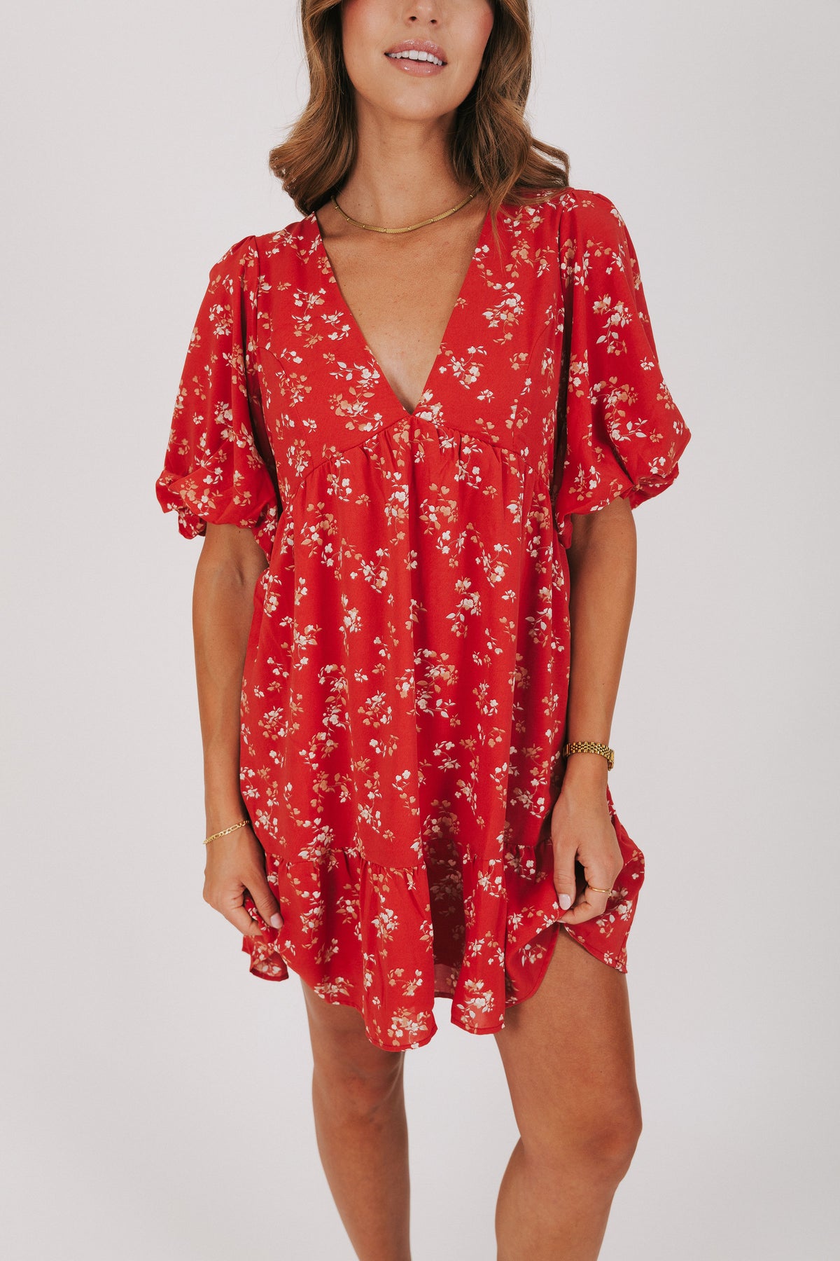 v-neck red and white floral dress with puff sleeves
