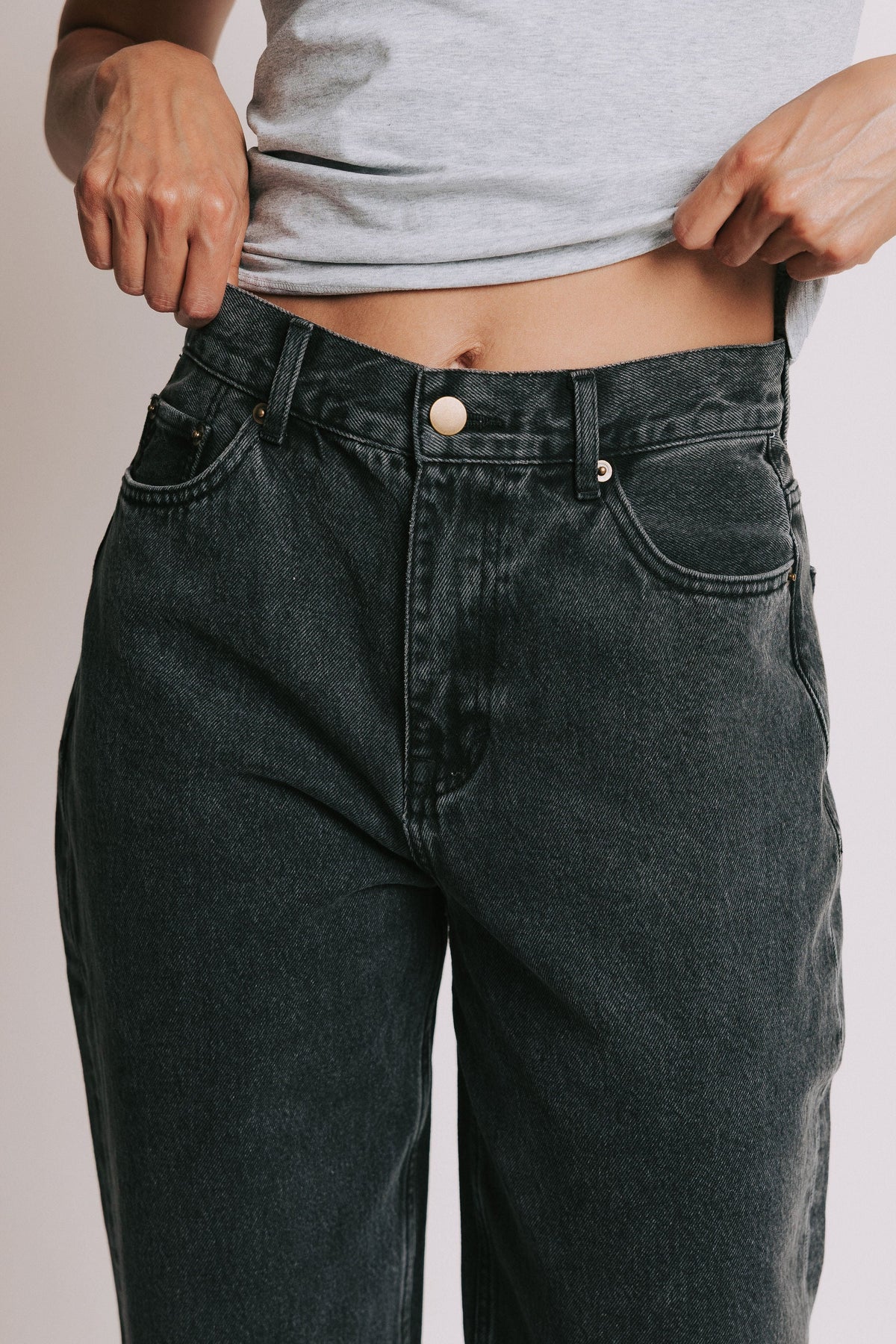 washed black straight leg jeans front