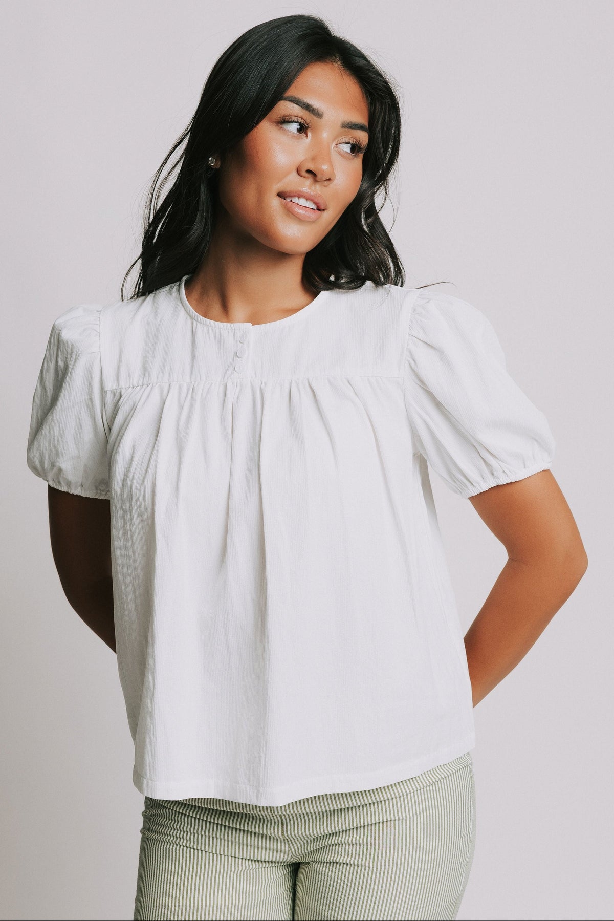 white gathered detail top with short puff sleeves