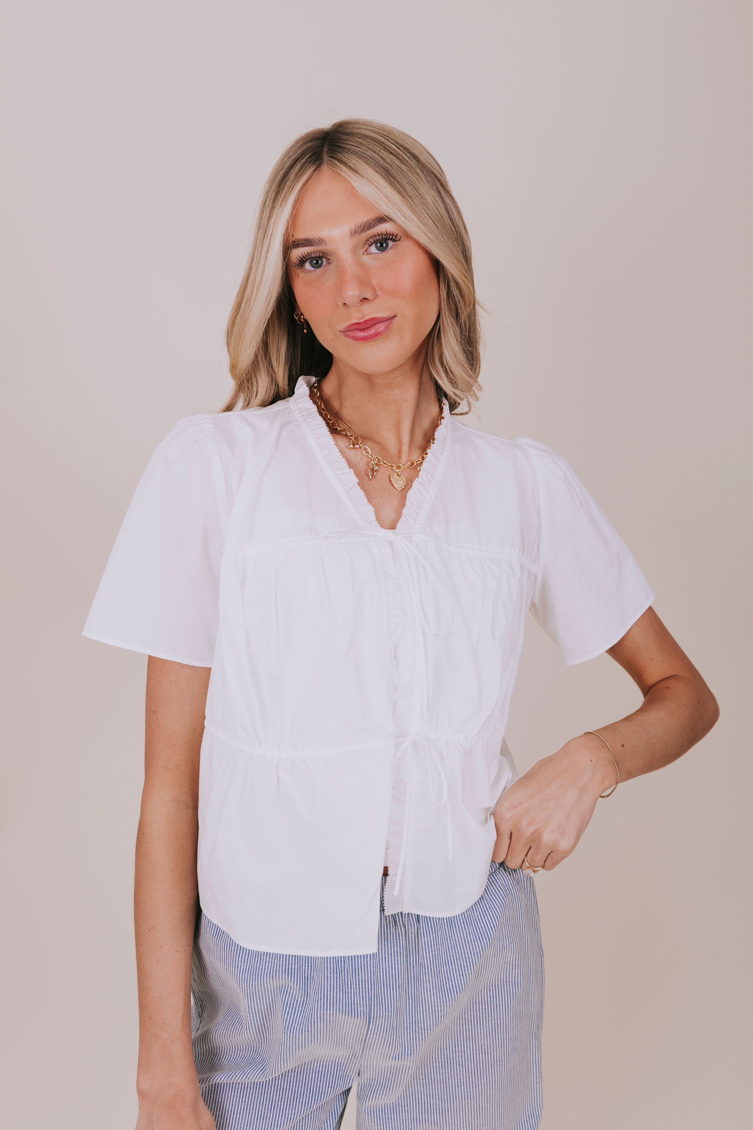 white v neck ruffled tied top front