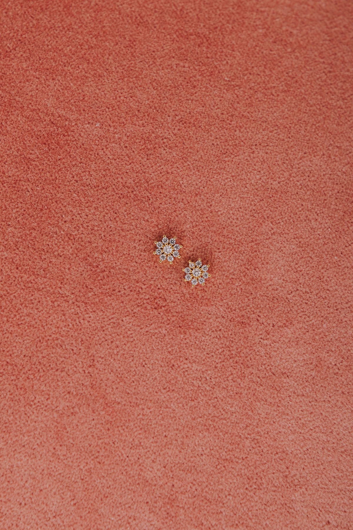 8 petal zirconia screw back earring flatlay