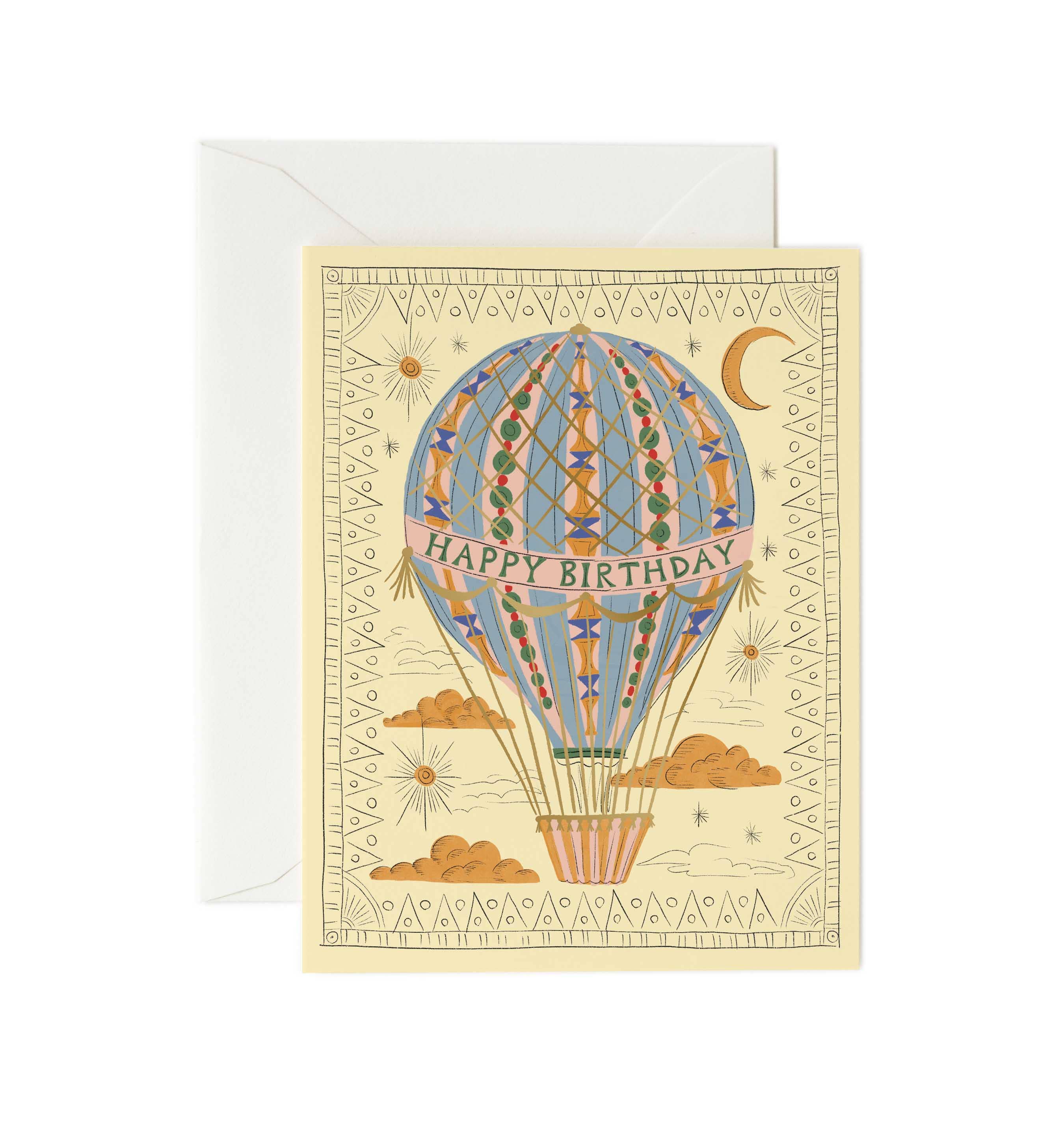 Greeting card with hot air balloon design and 'Happy Birthday' text, featuring a white envelope.