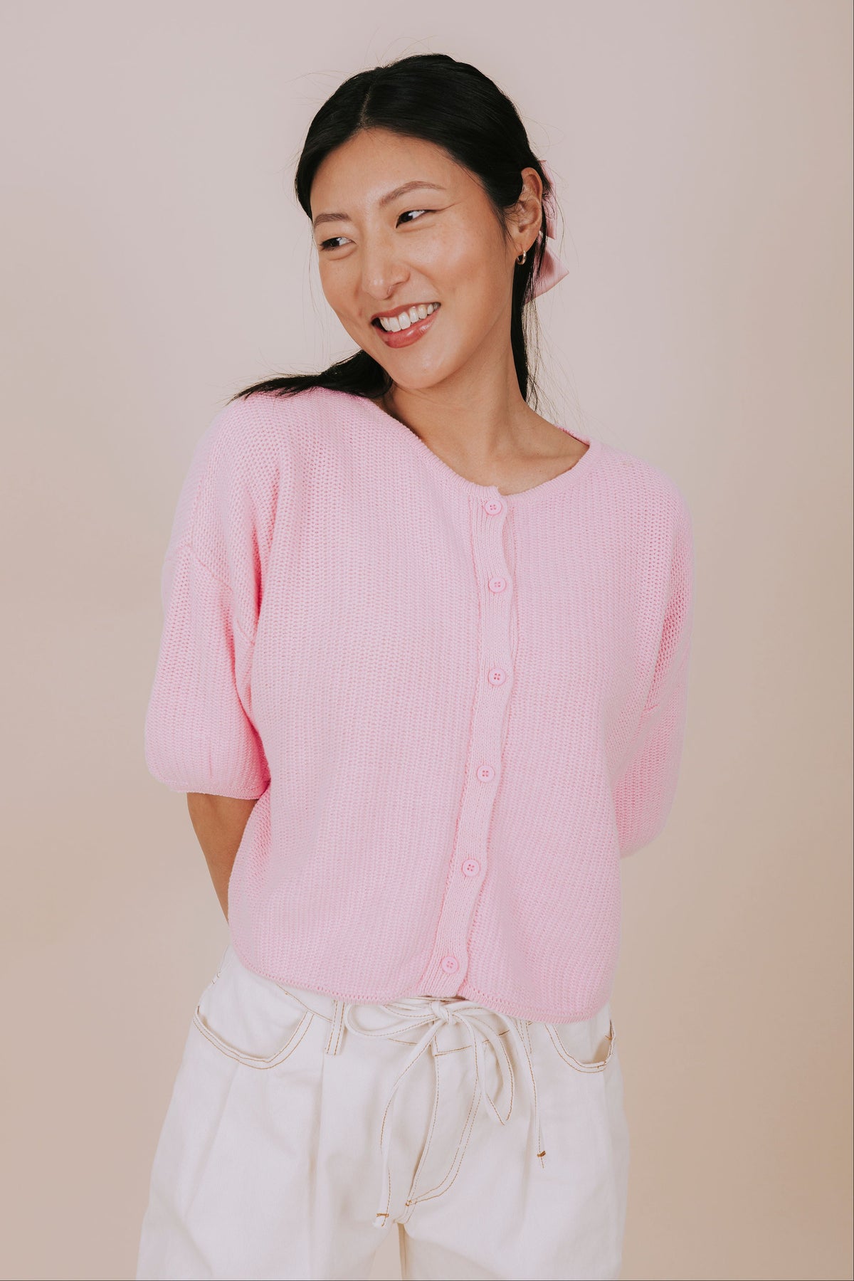 baby pink soft knit short sleeve cardigan front