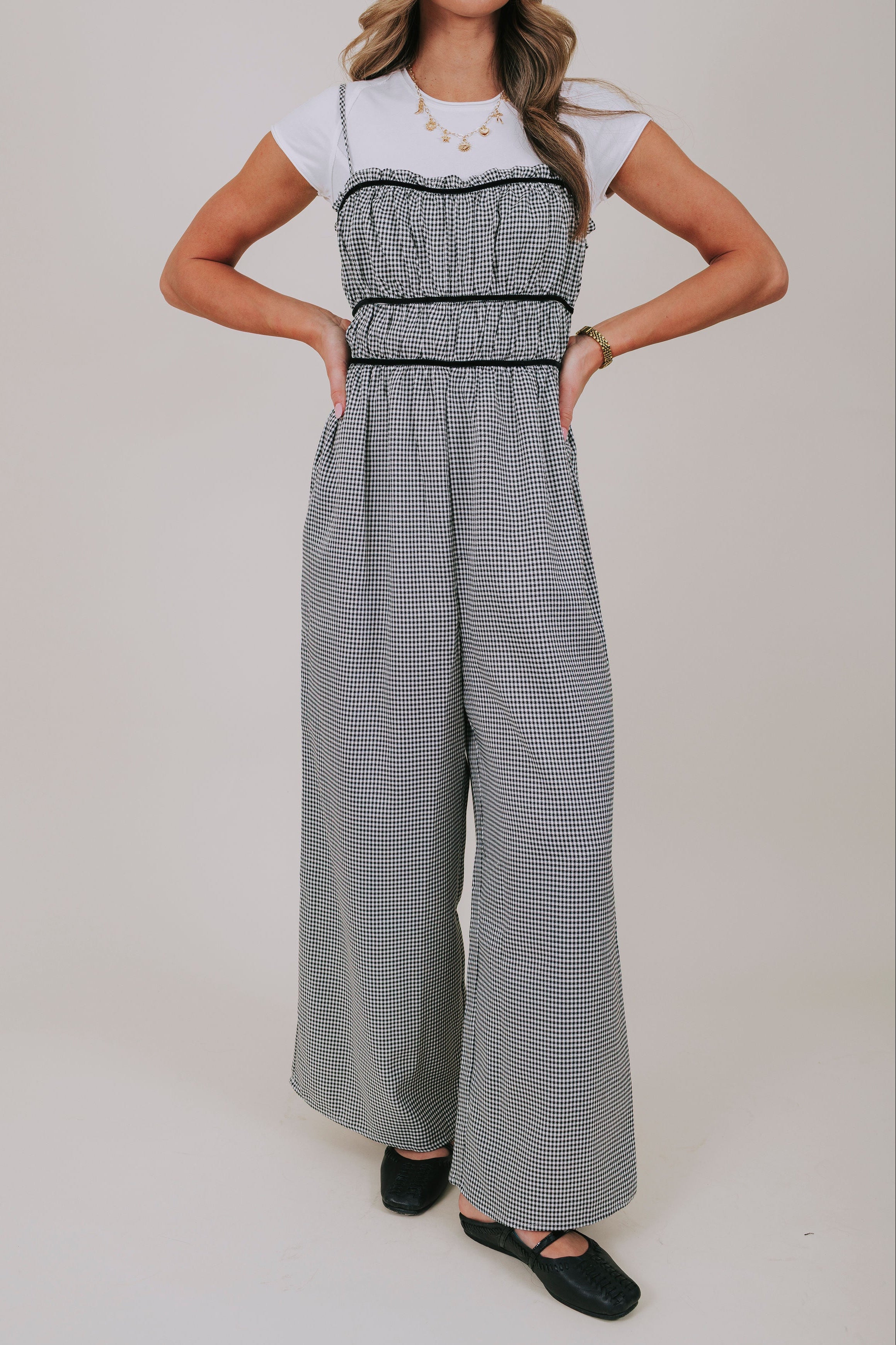 black and white gingham jumpsuit close up