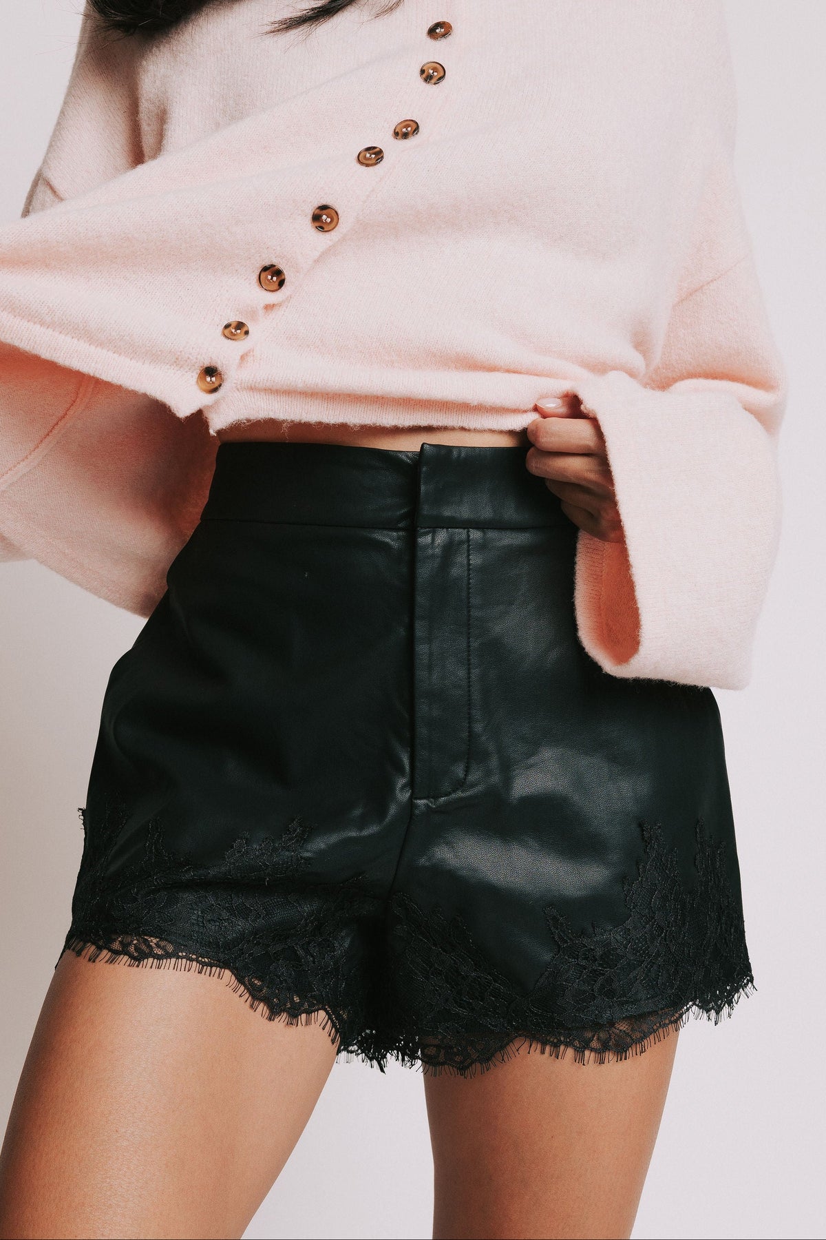 black leather shorts with lace trim front