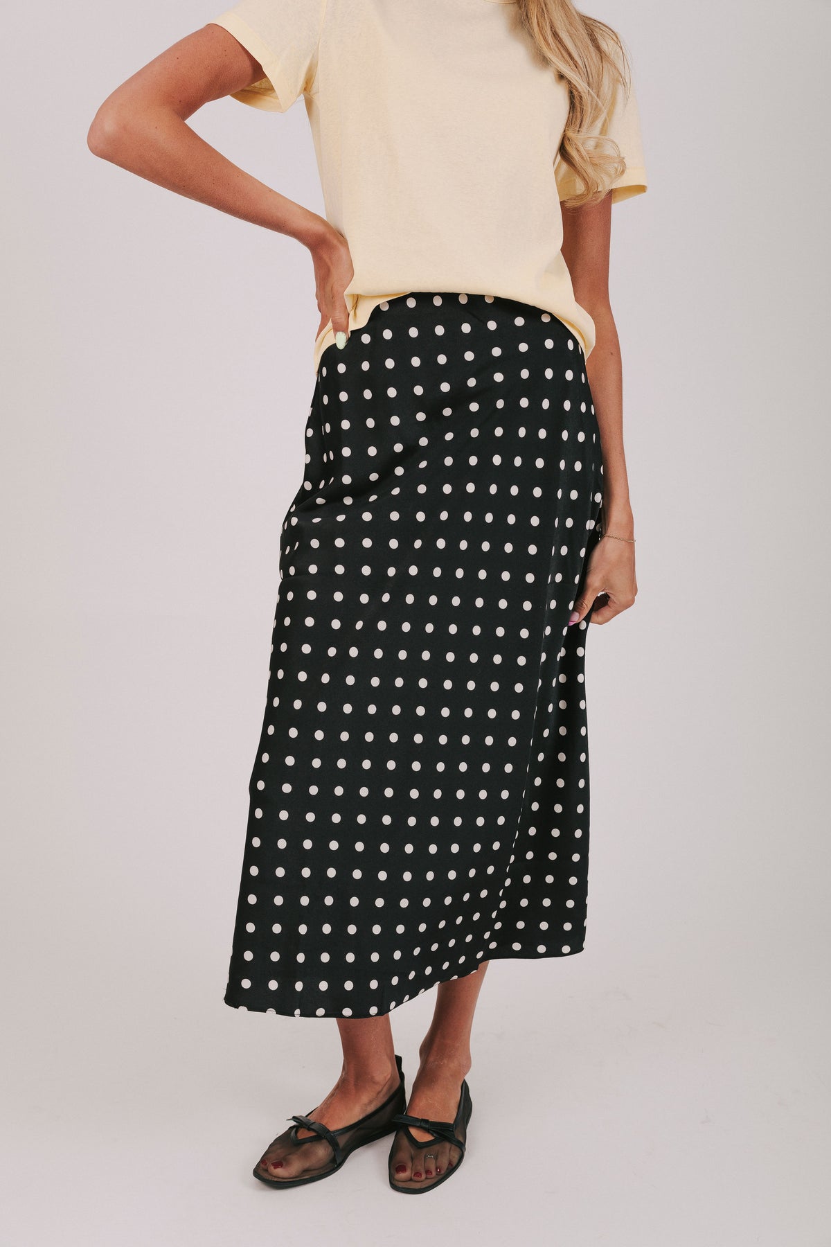 Satin maxi length skirt in black with white polka dots 