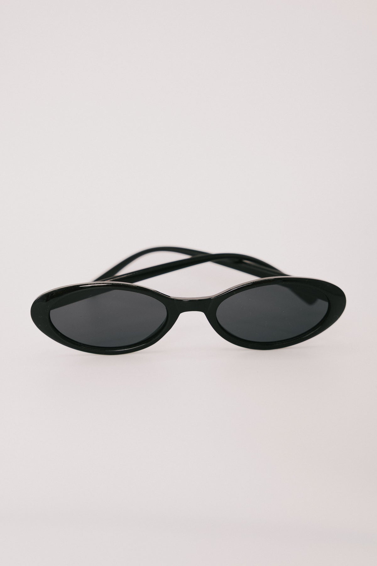 black oval sunglasses