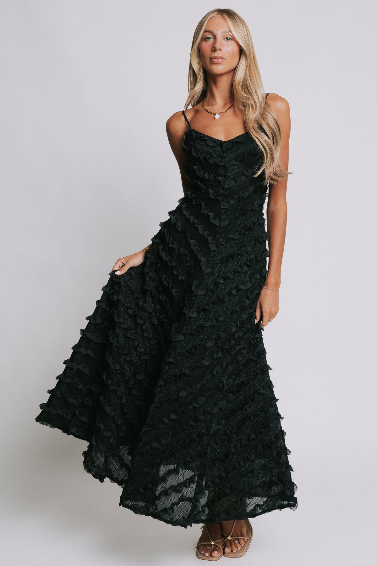 black ruffled dress with sweetheart neckline full
