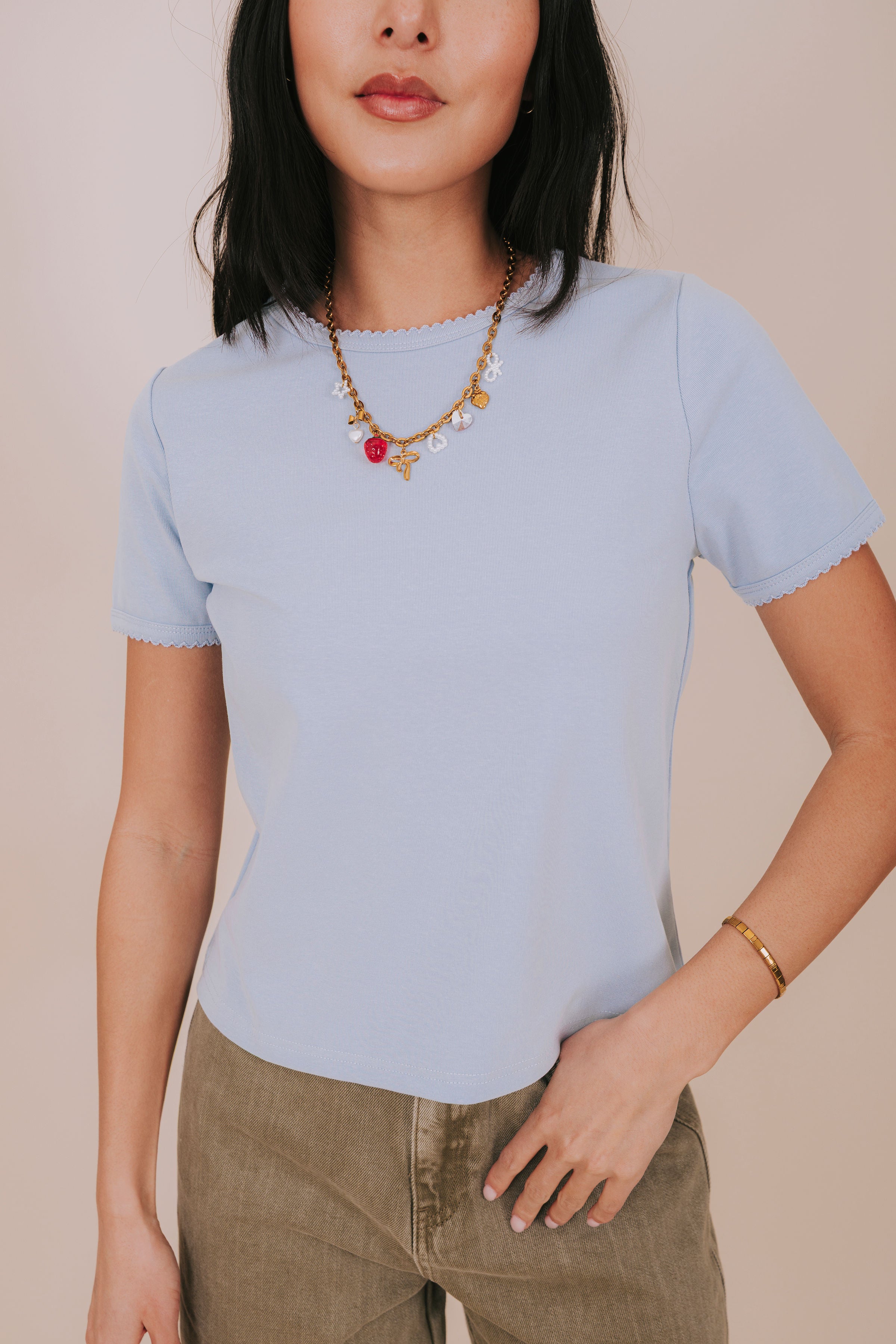 blue scallop trim crew neck tee detail