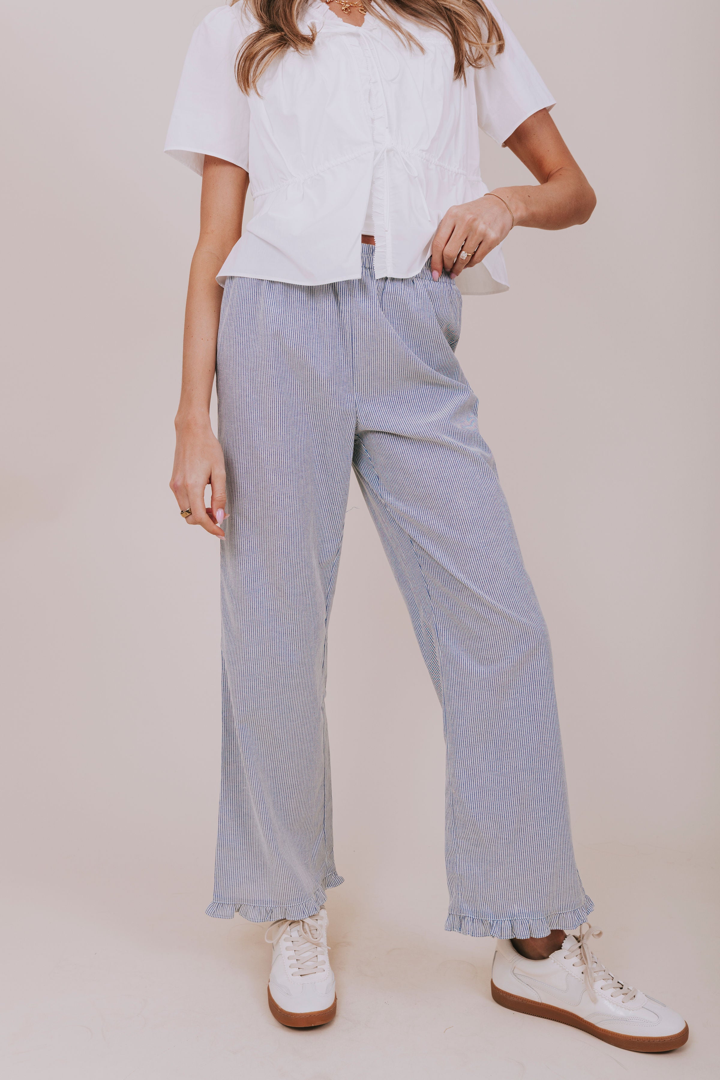 blue striped pants with ruffle front