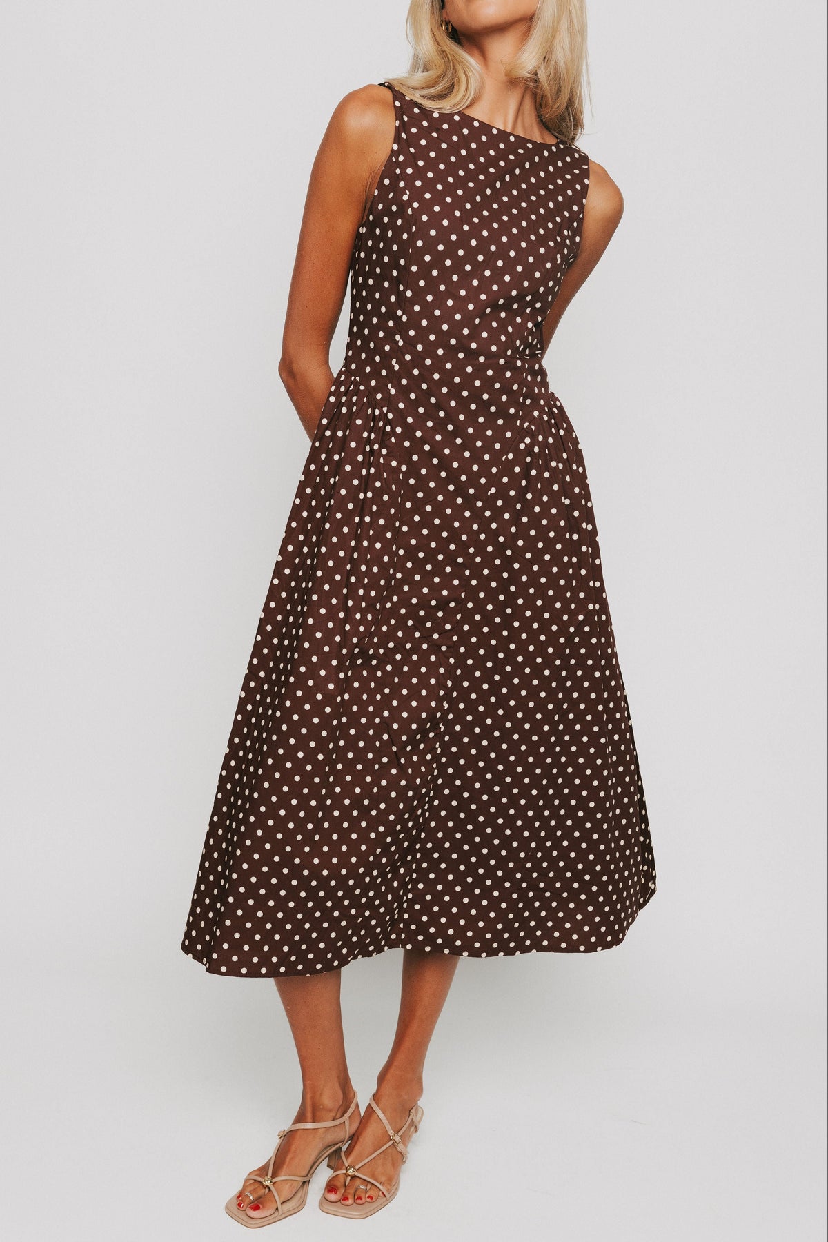 brown and cream polka dot fitted midi dress front