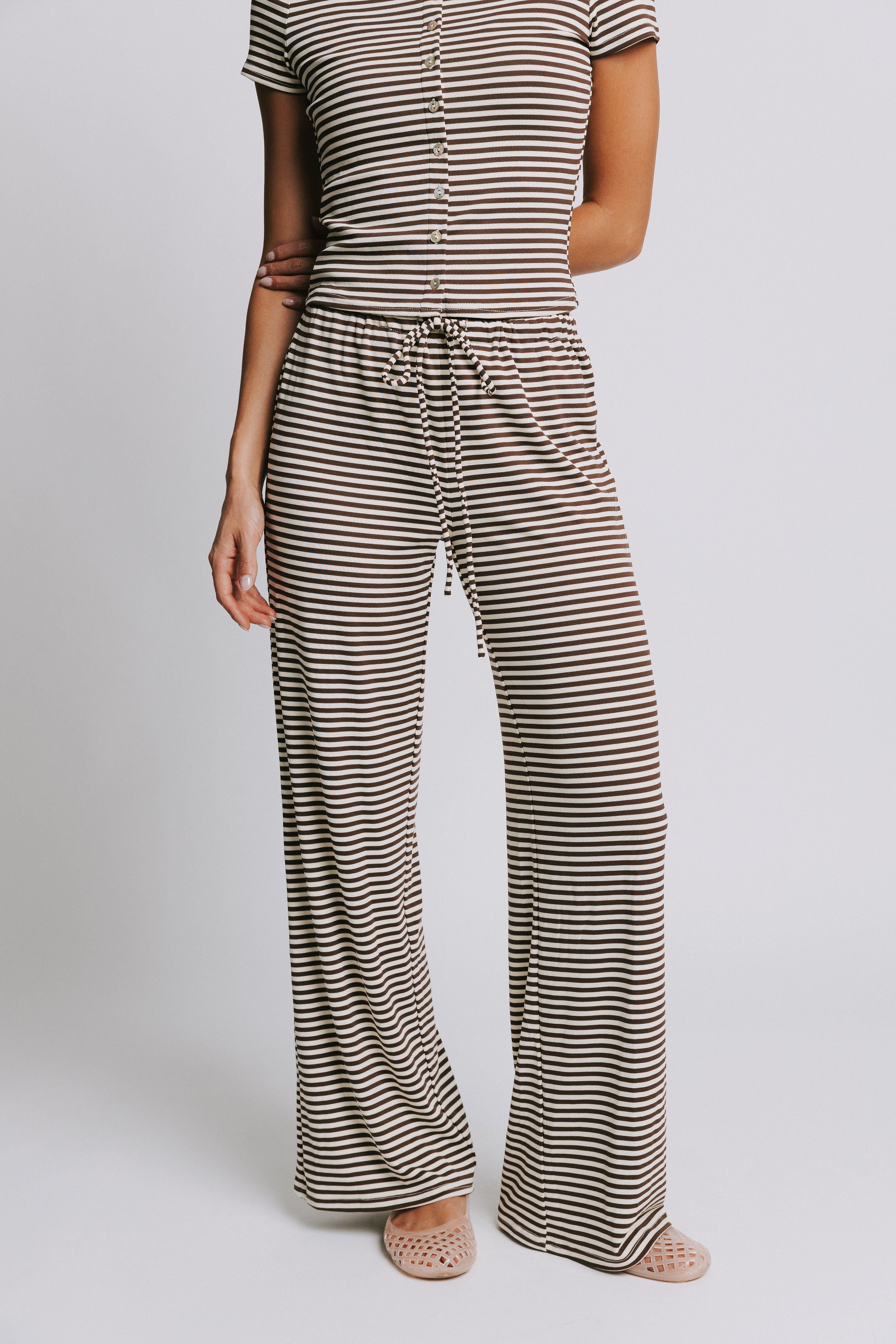 brown and cream striped pants with elastic waistband