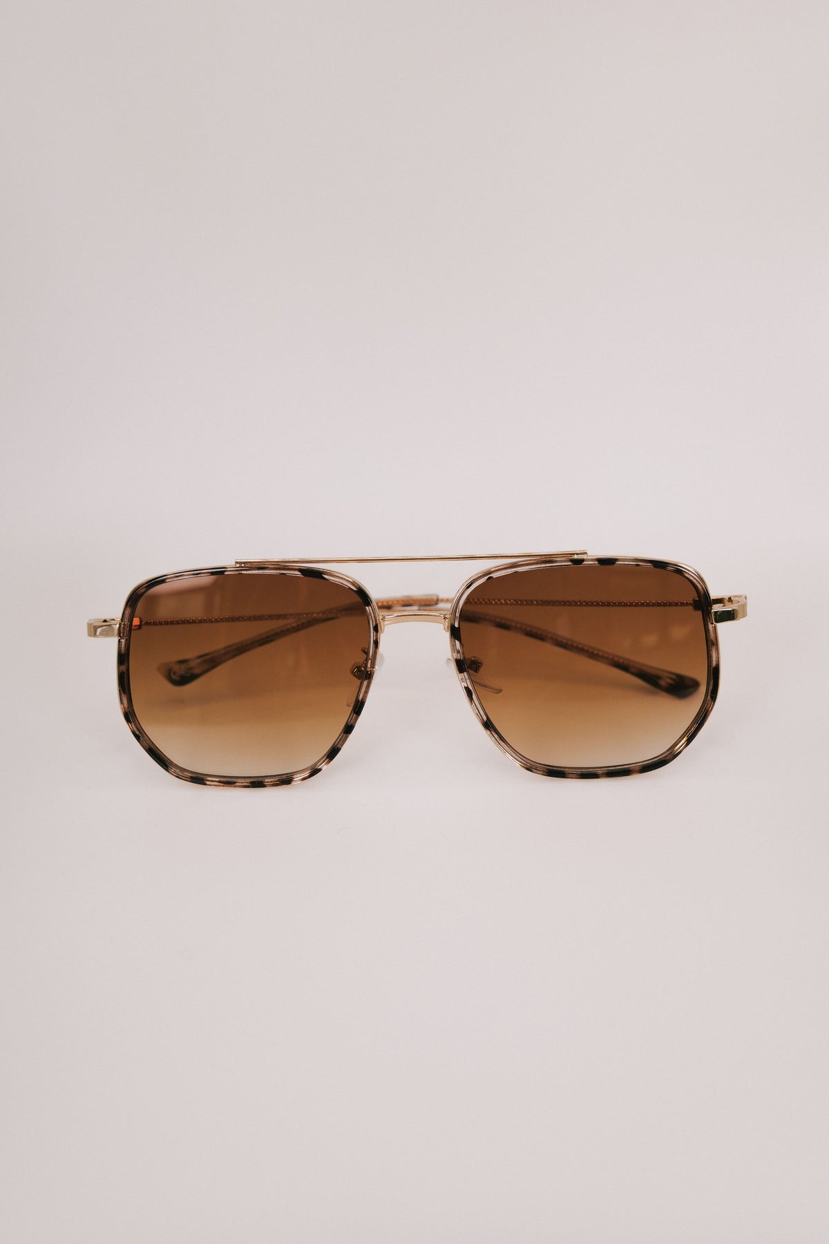 brown and gold aviator sunglasses