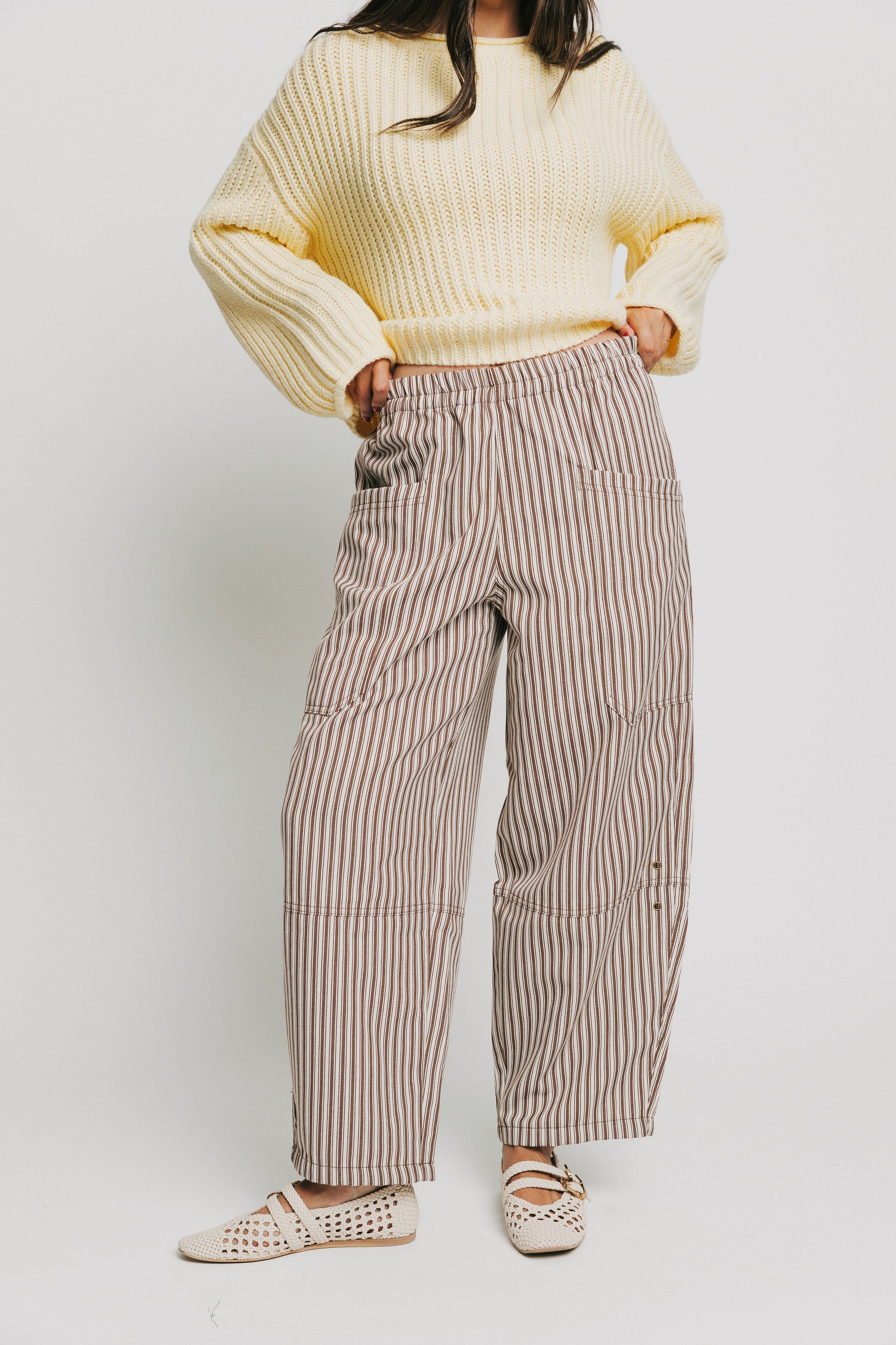 brown and white striped barrel pants with ruffled waistline