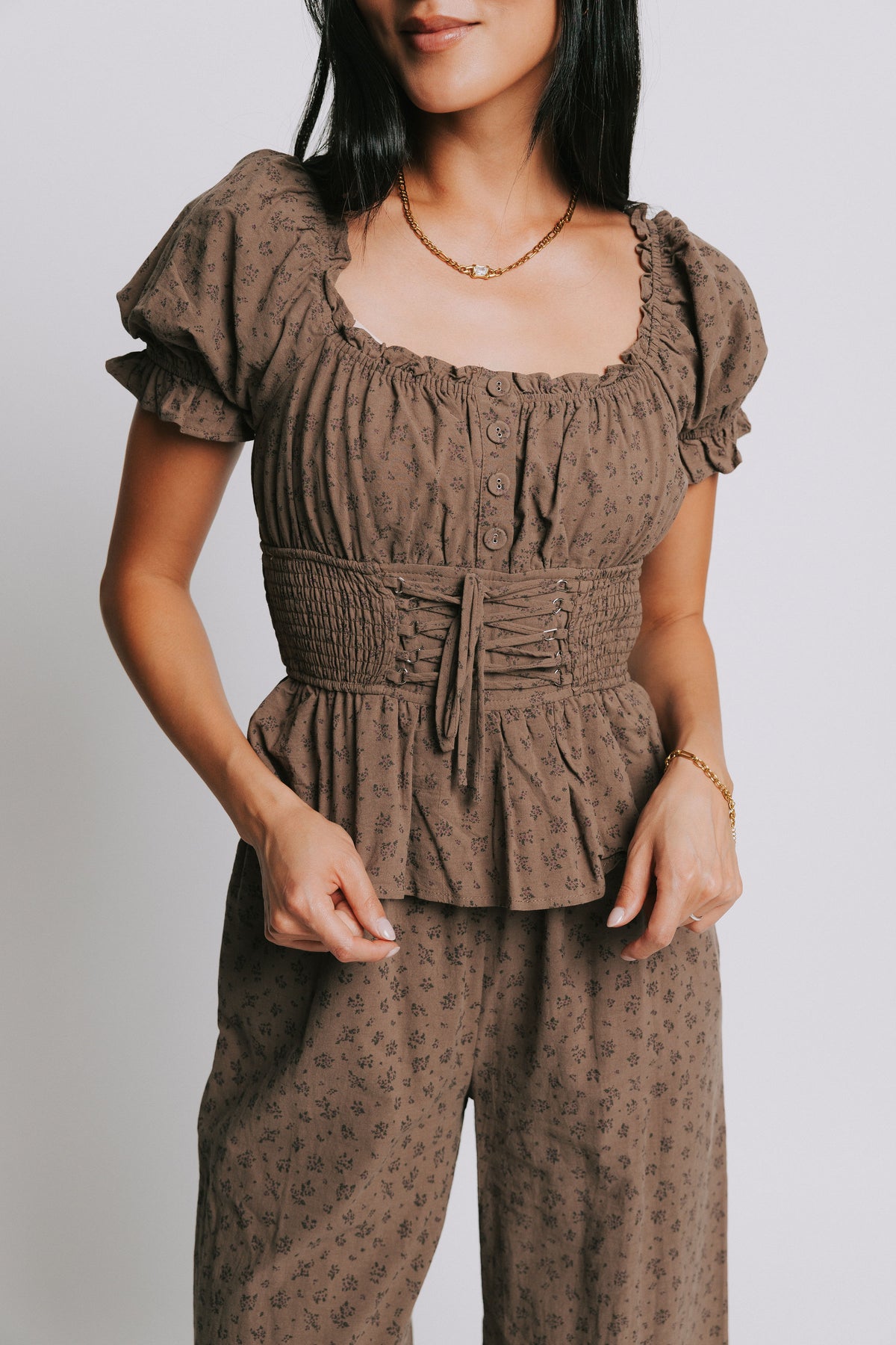 brown floral jumpsuit with corset style bodice 