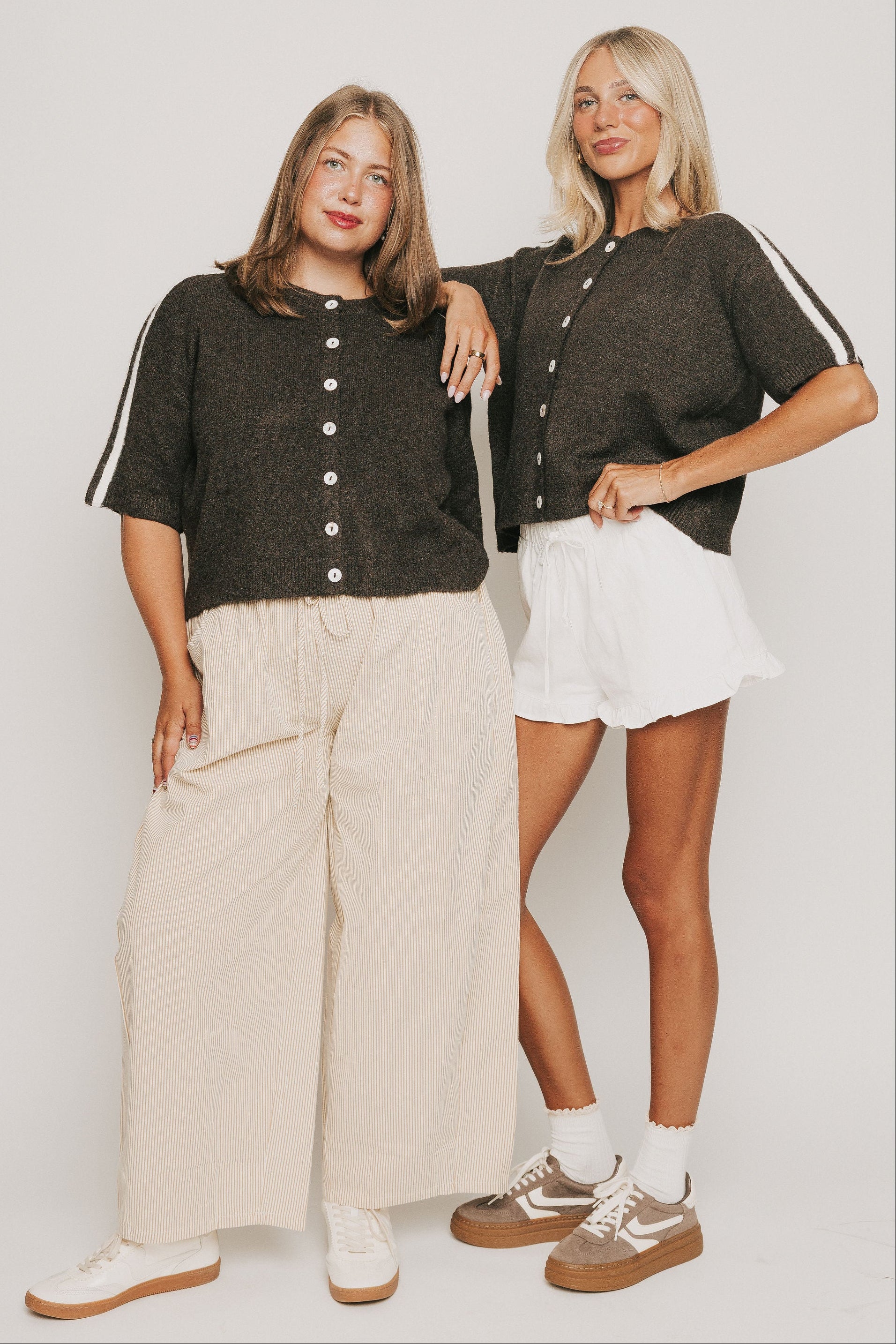 brown short sleeve cardigan with stripes on shoulders