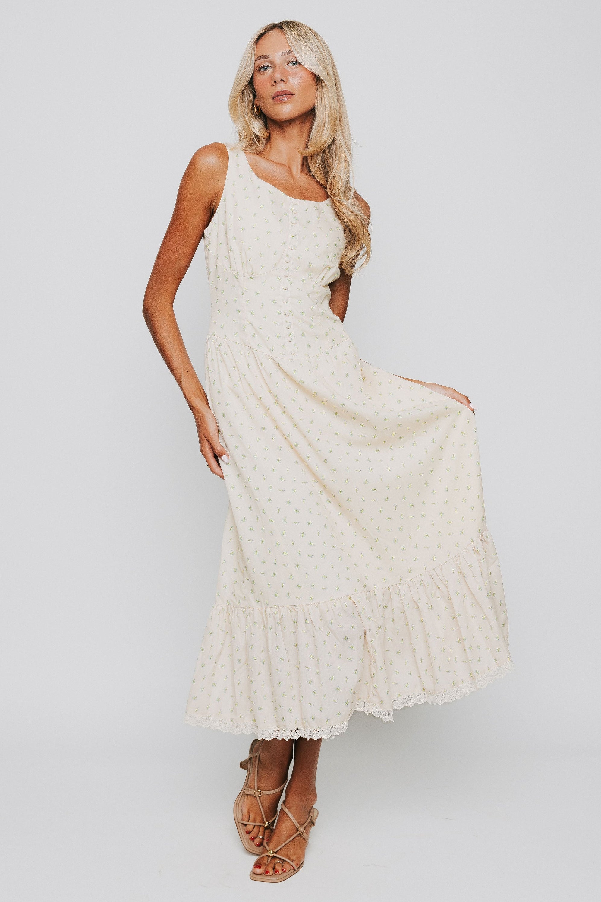 butter yellow midi dress with floral pattern and button down bodice full