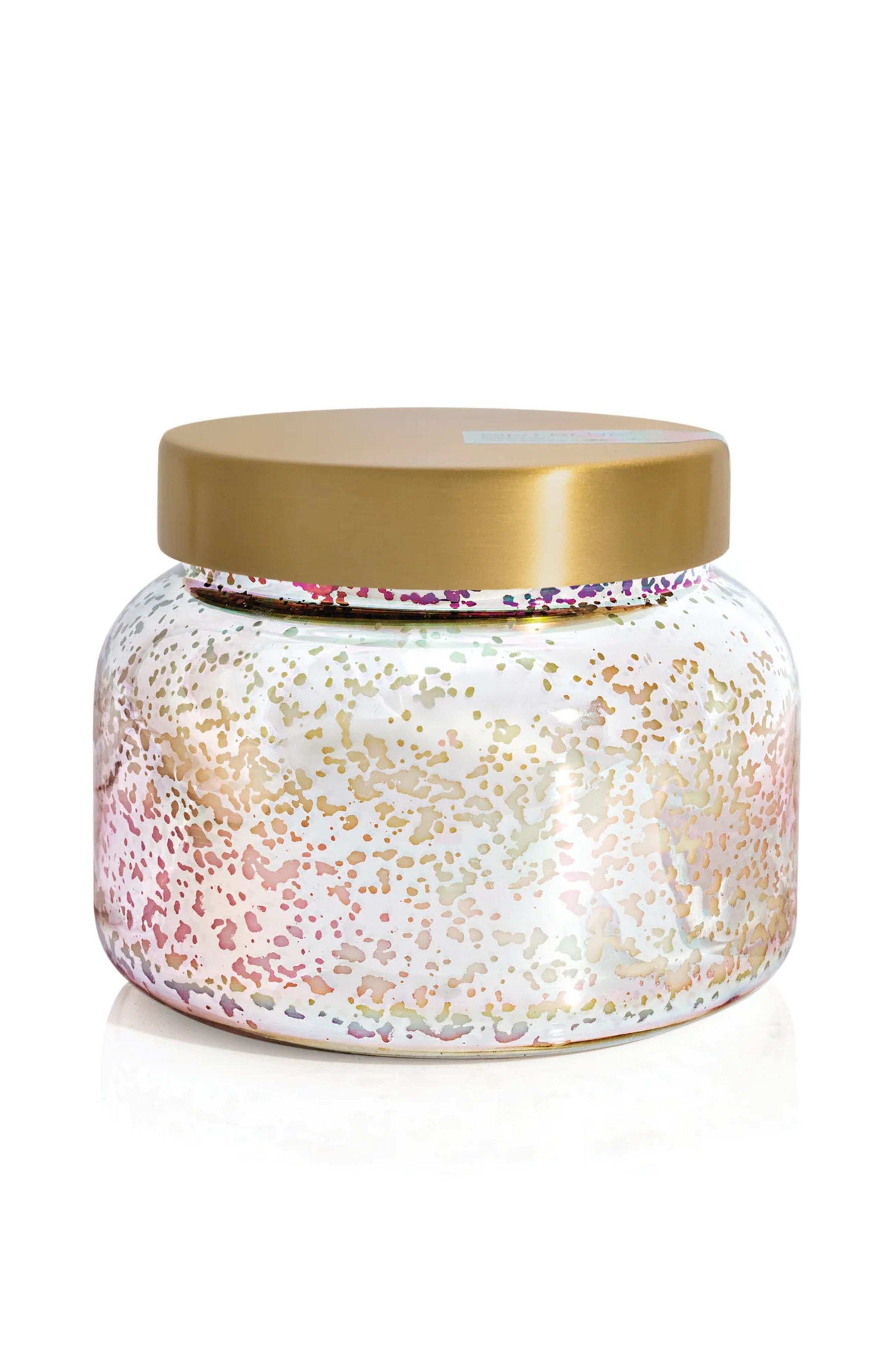 Iridescent candle jar with gold lid.