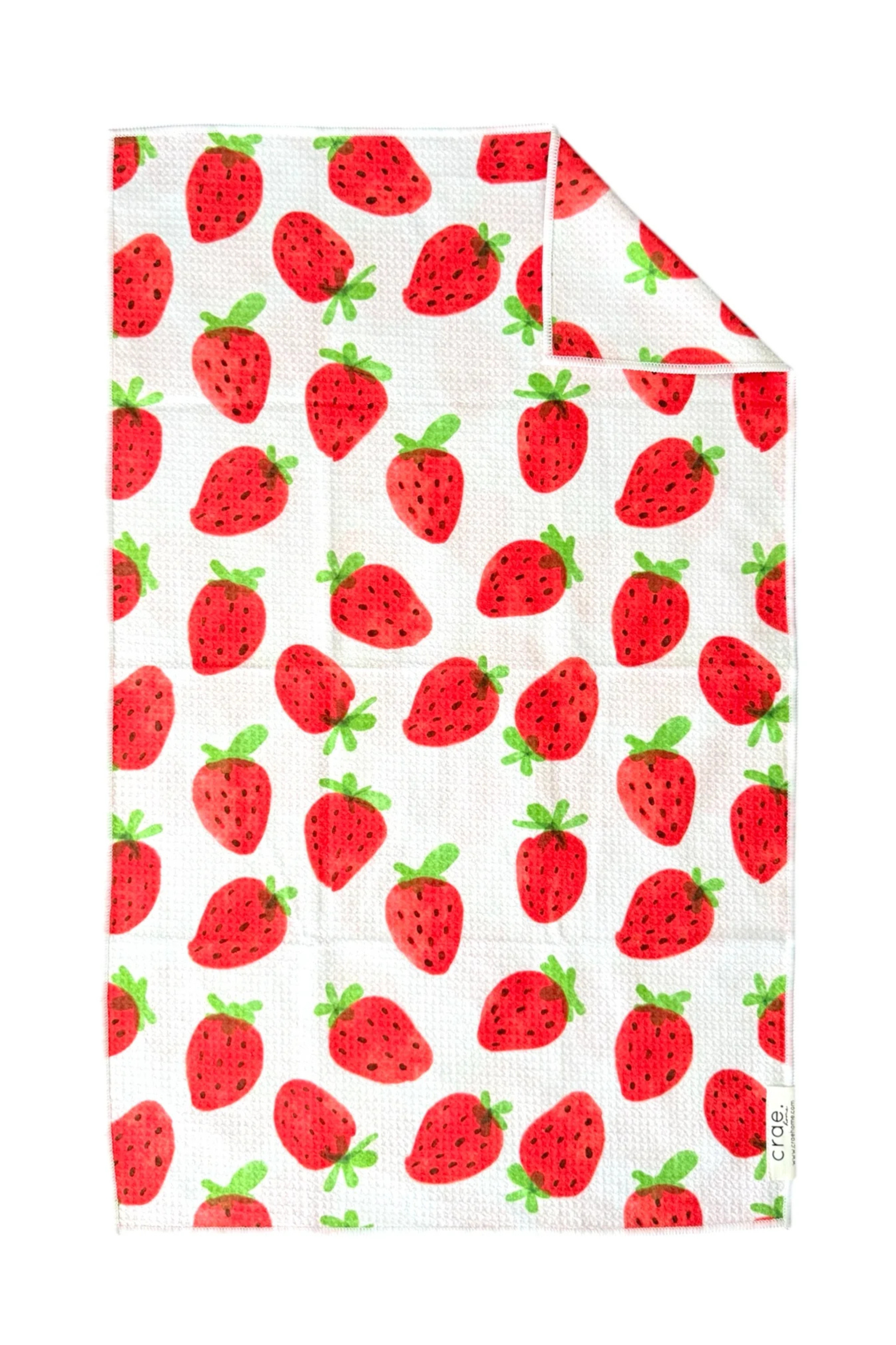 Microfiber hand towel with red strawberry pattern on a white background
