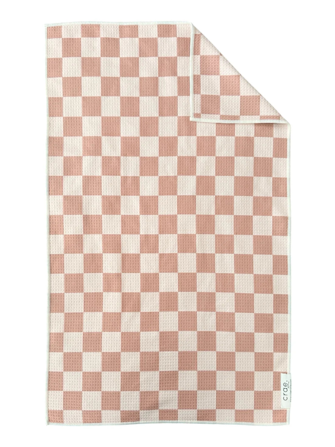 A double-sided hand towel with a light pink taupe checkered design, made of high-absorbent waffle weave and microfiber material.