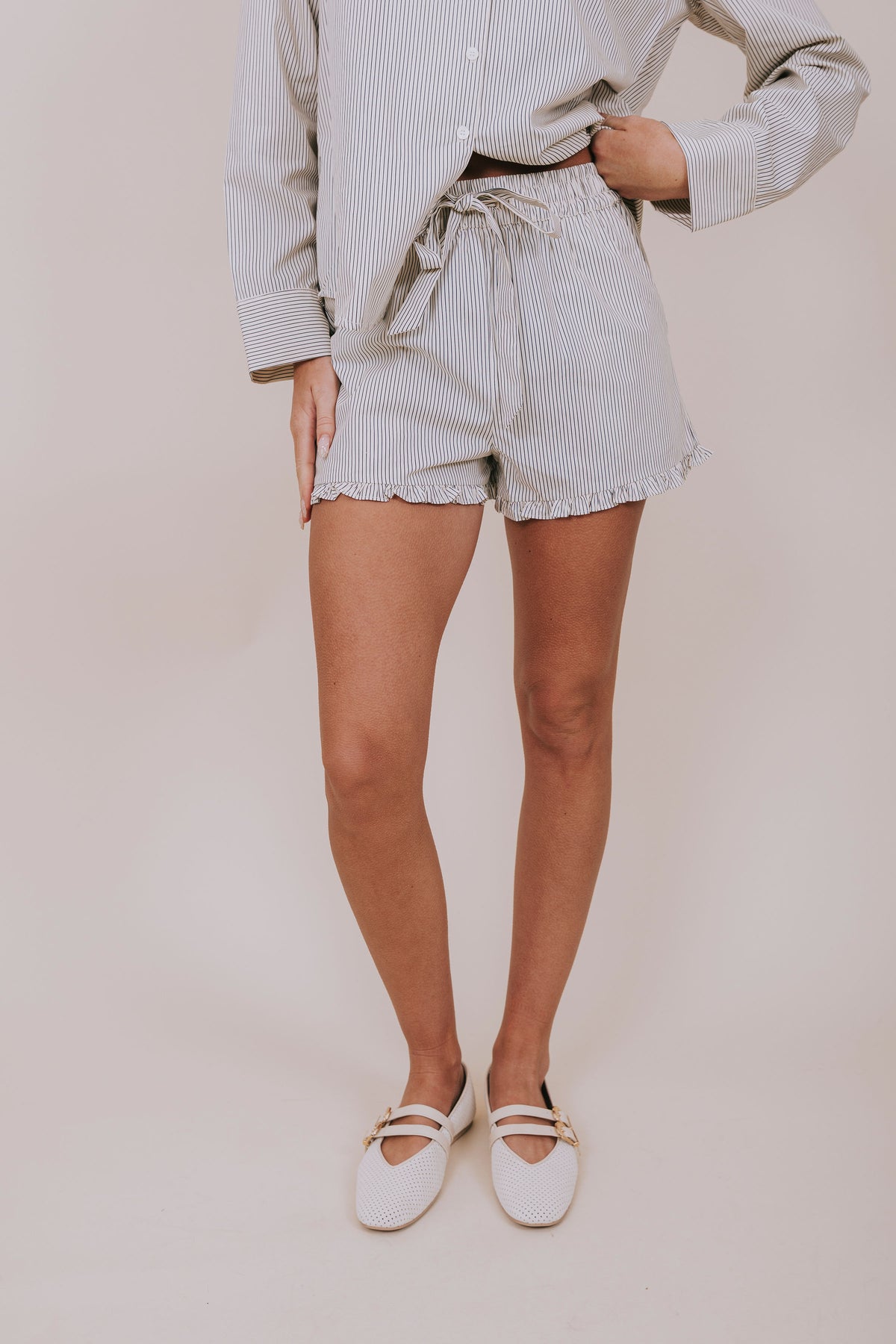 cream blue stripe ruffle shorts front