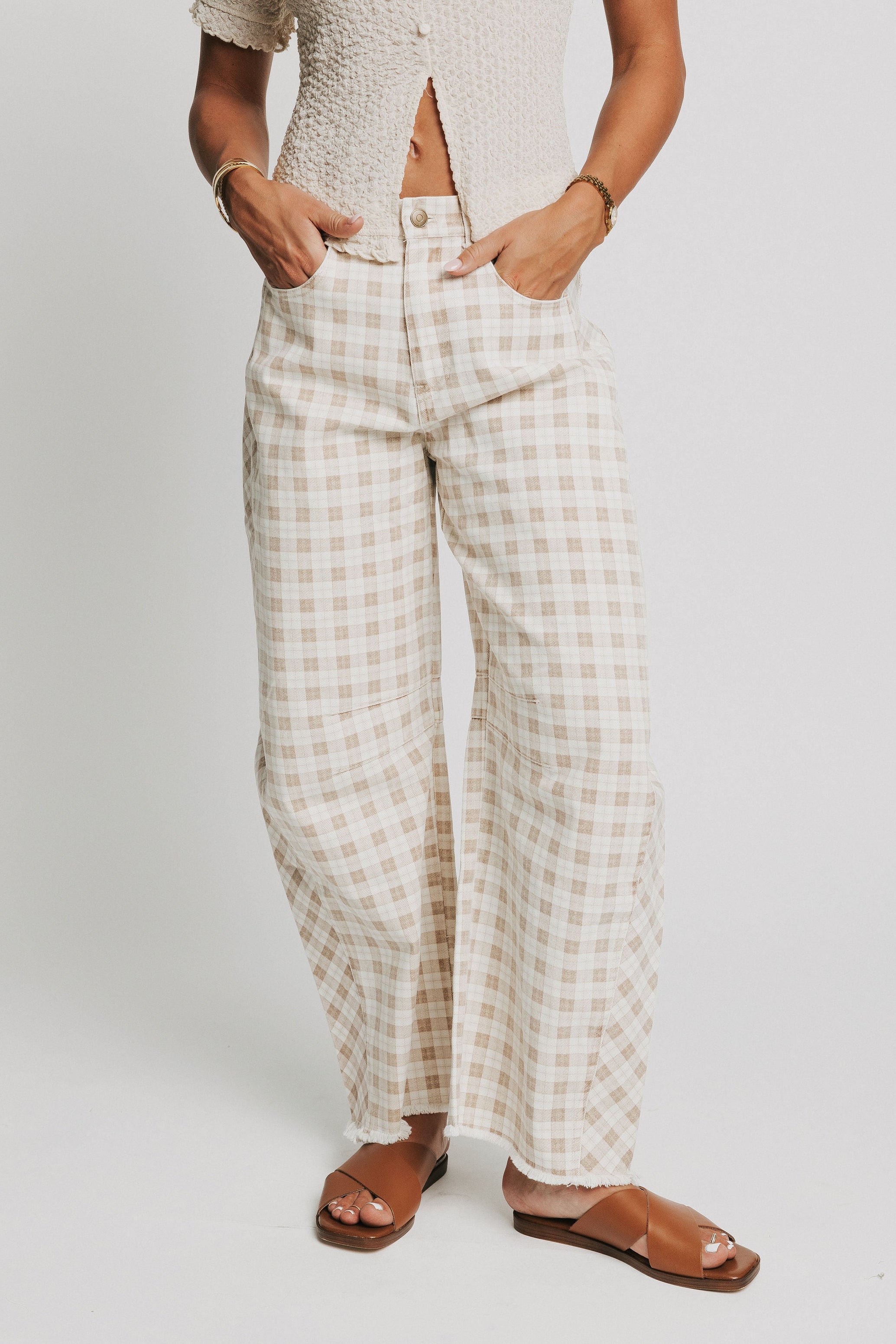 cream plaid barrel jeans with raw hem