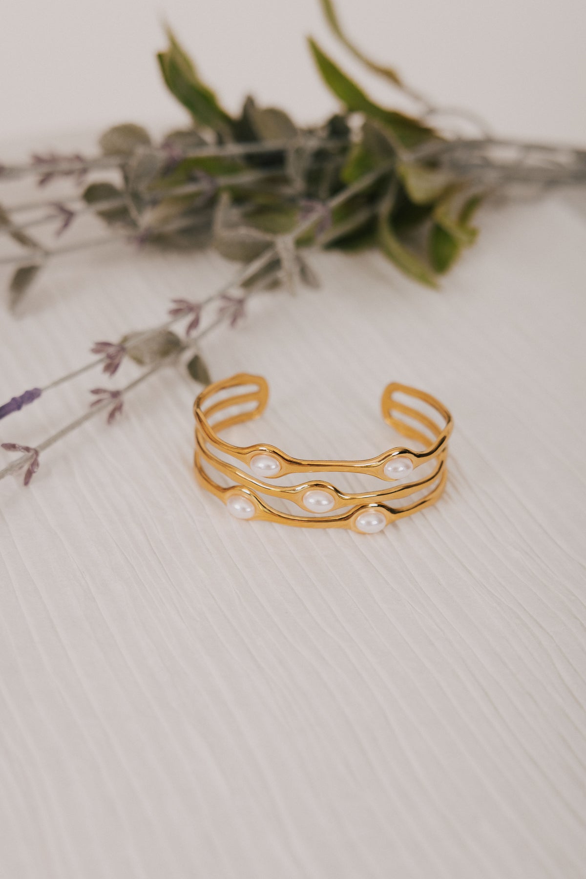 cuff style bracelet with pearls