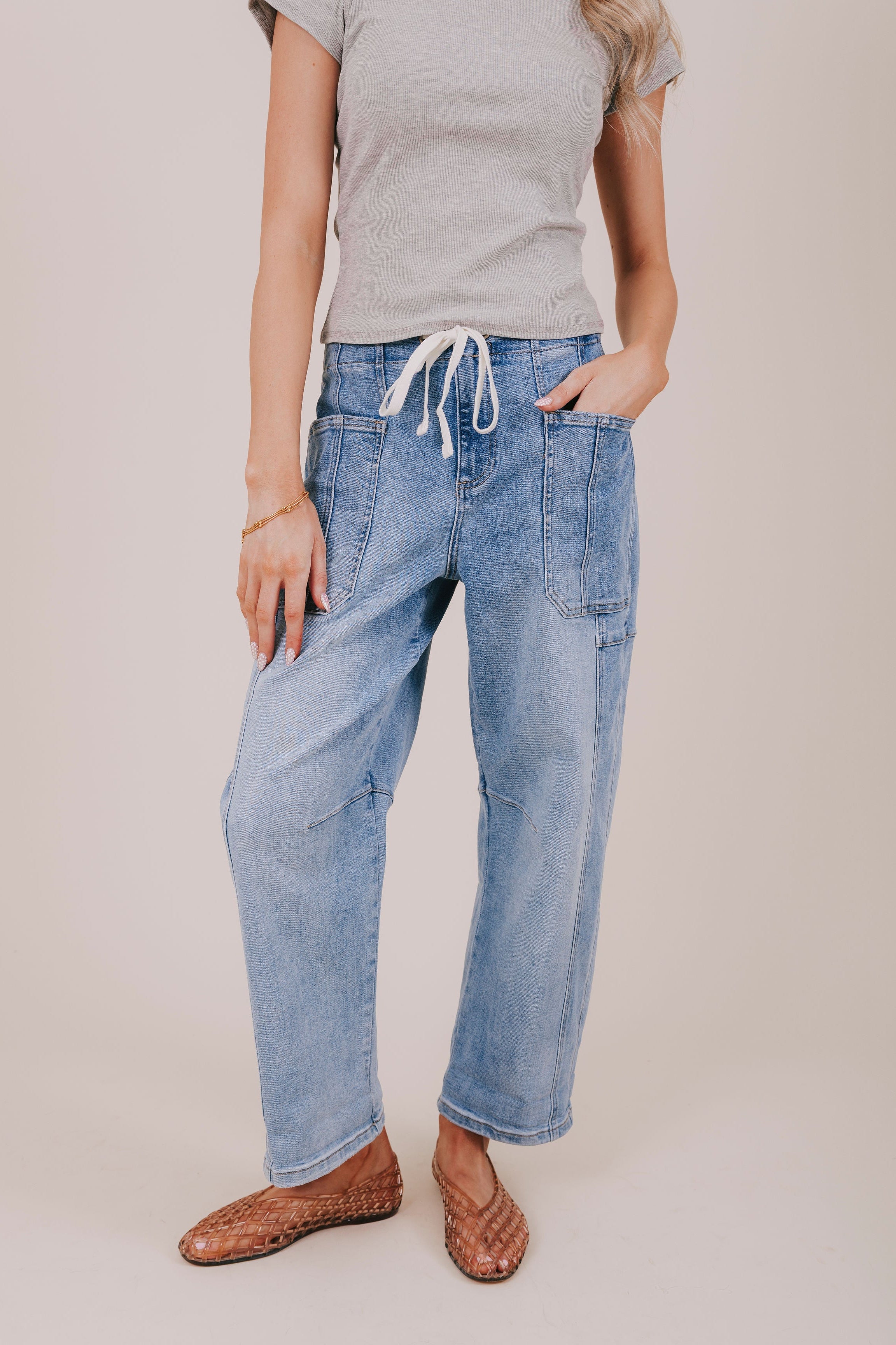 denim cargo pocket drawstring barrel jeans front