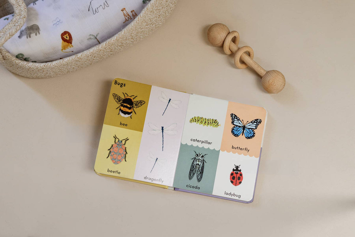 baby book of first words with embroidery styled art 