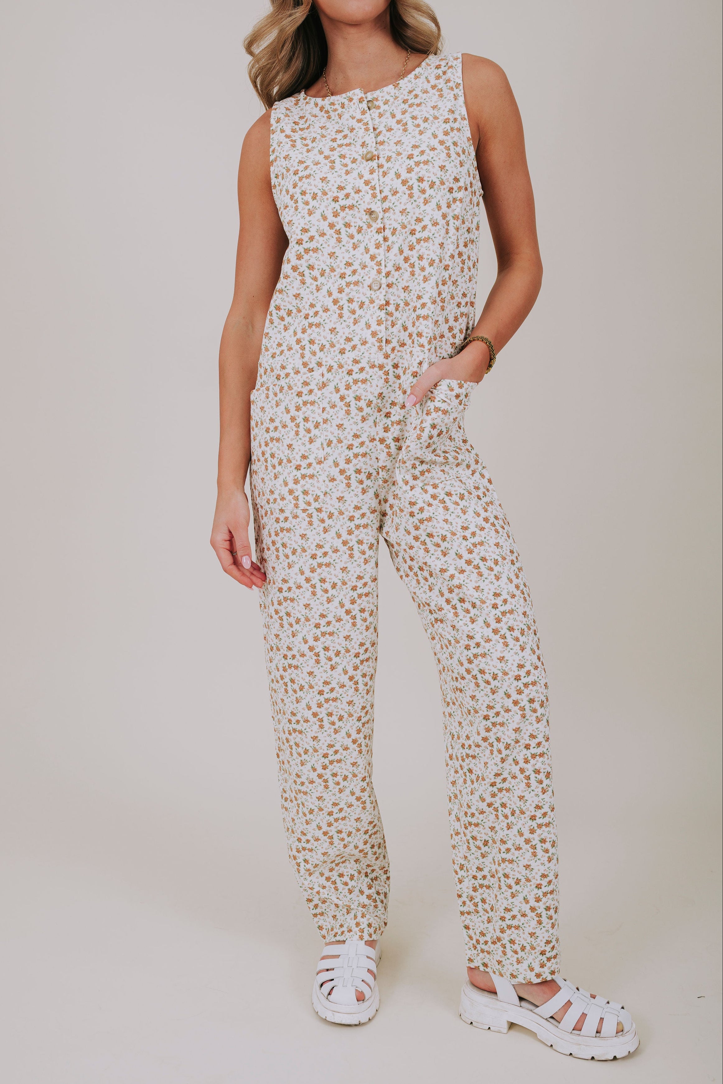 floral button front jumpsuit close up