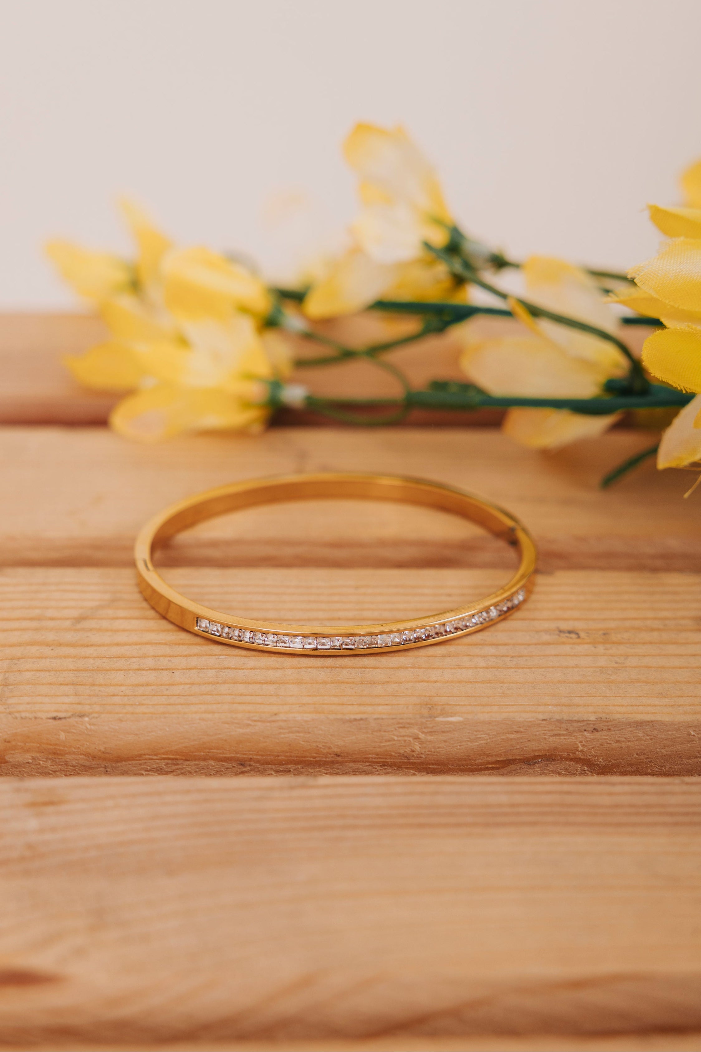 gold bangle bracelet with rhinestone cubic zirconia line 