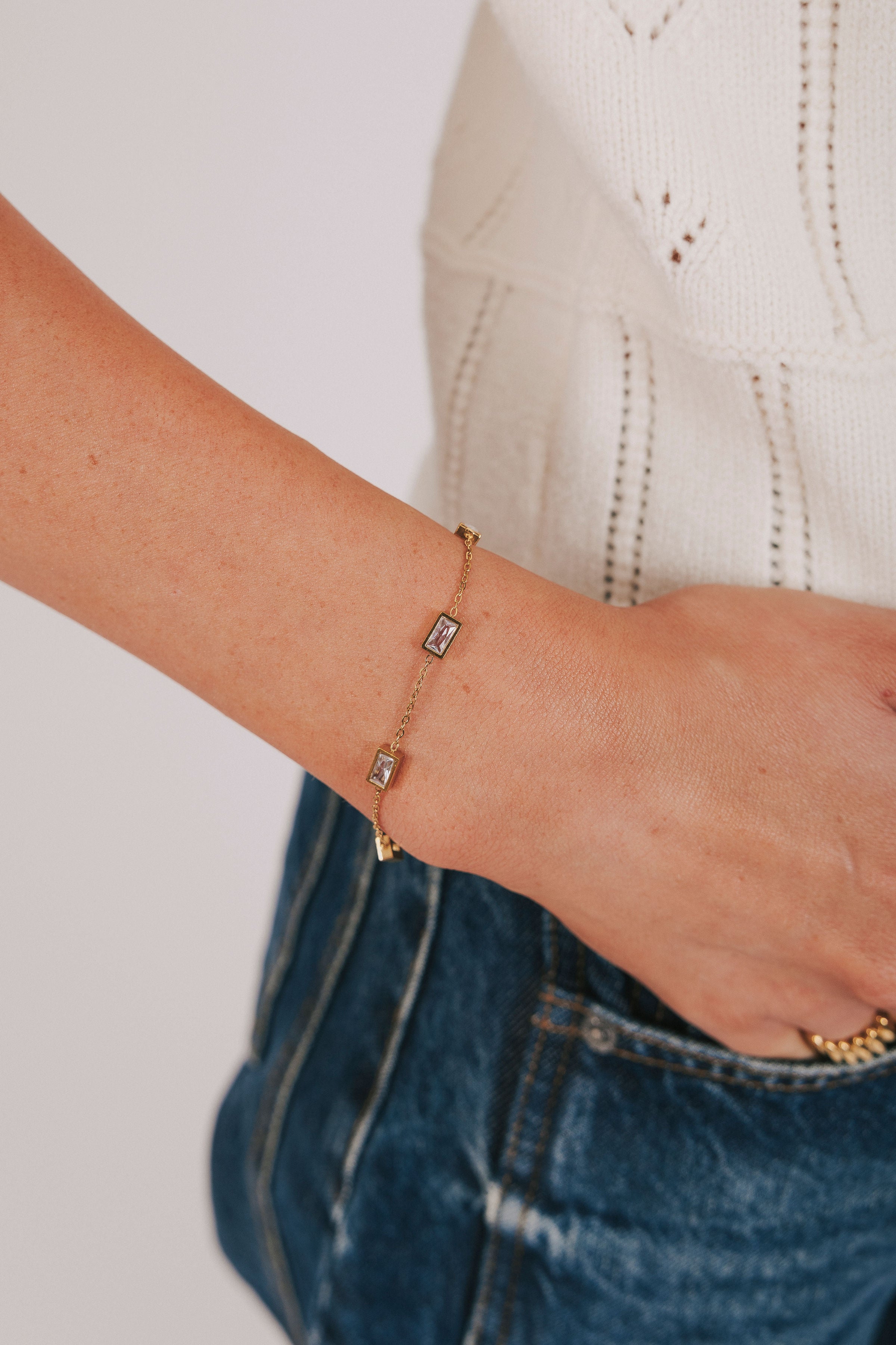 gold chain bracelet with rectangular pendants 