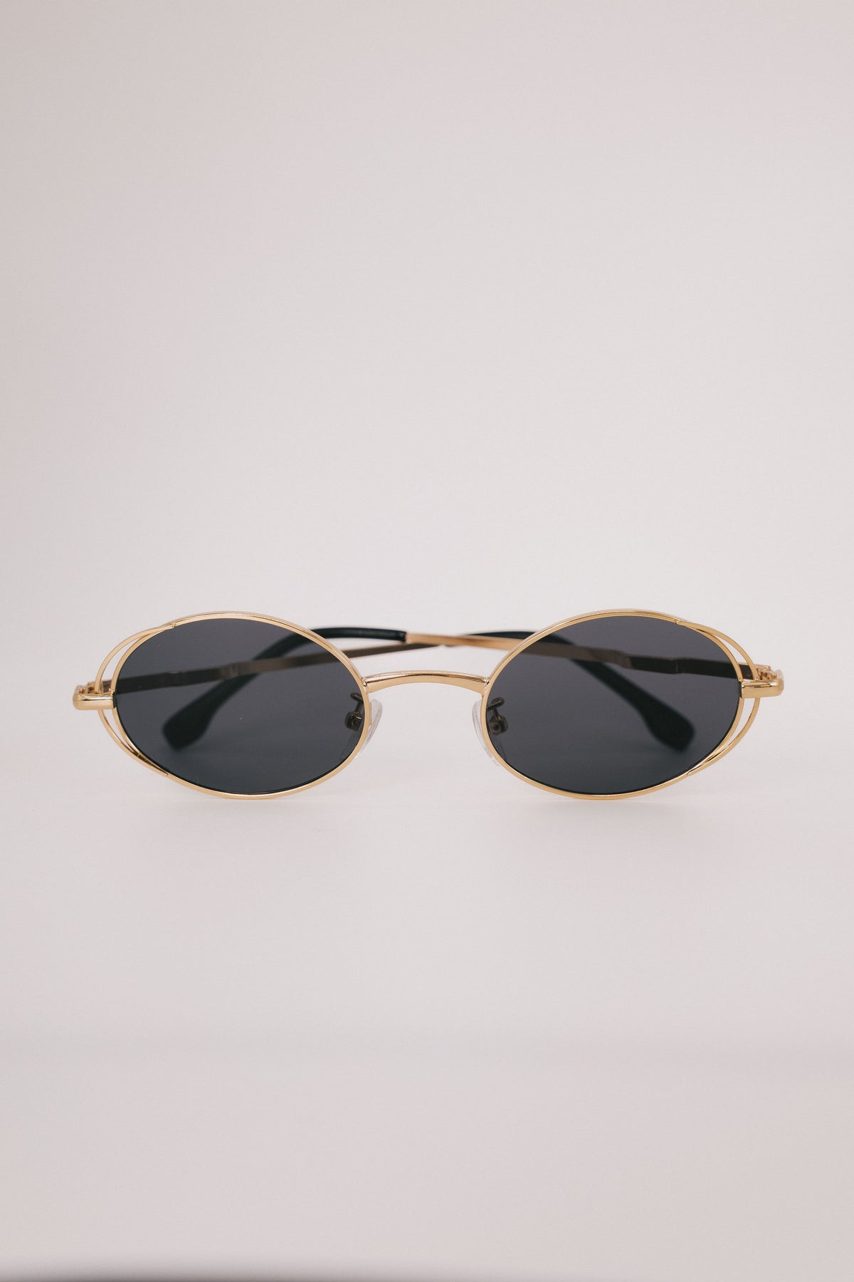 gold rimmed geometric sunglasses 
