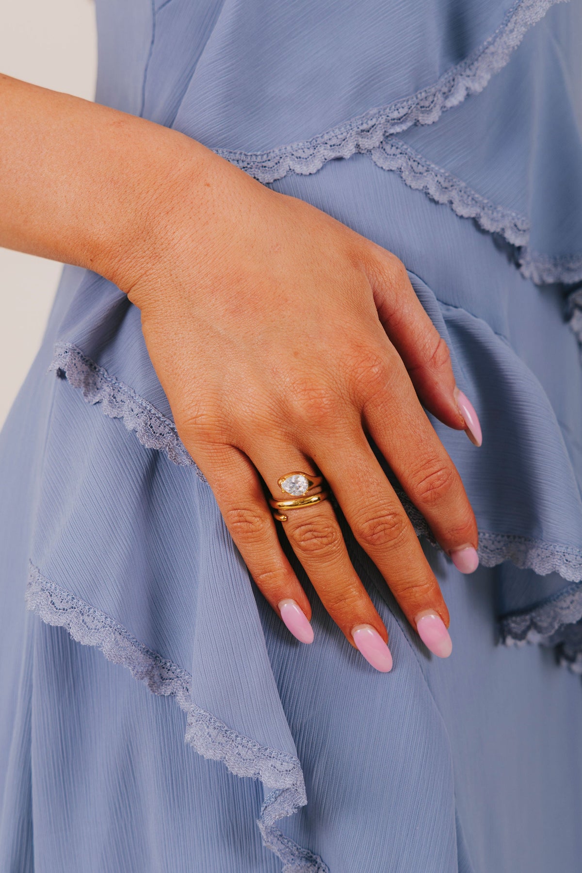 Gold spiral ring with diamond detail