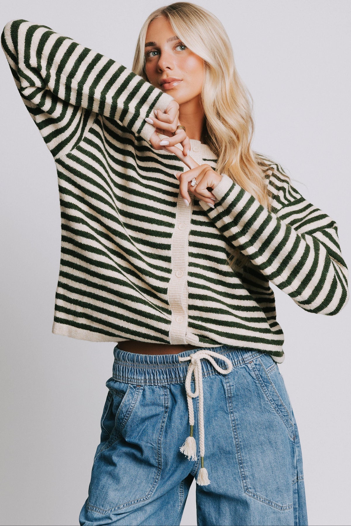 green and tan striped button down cardigan 