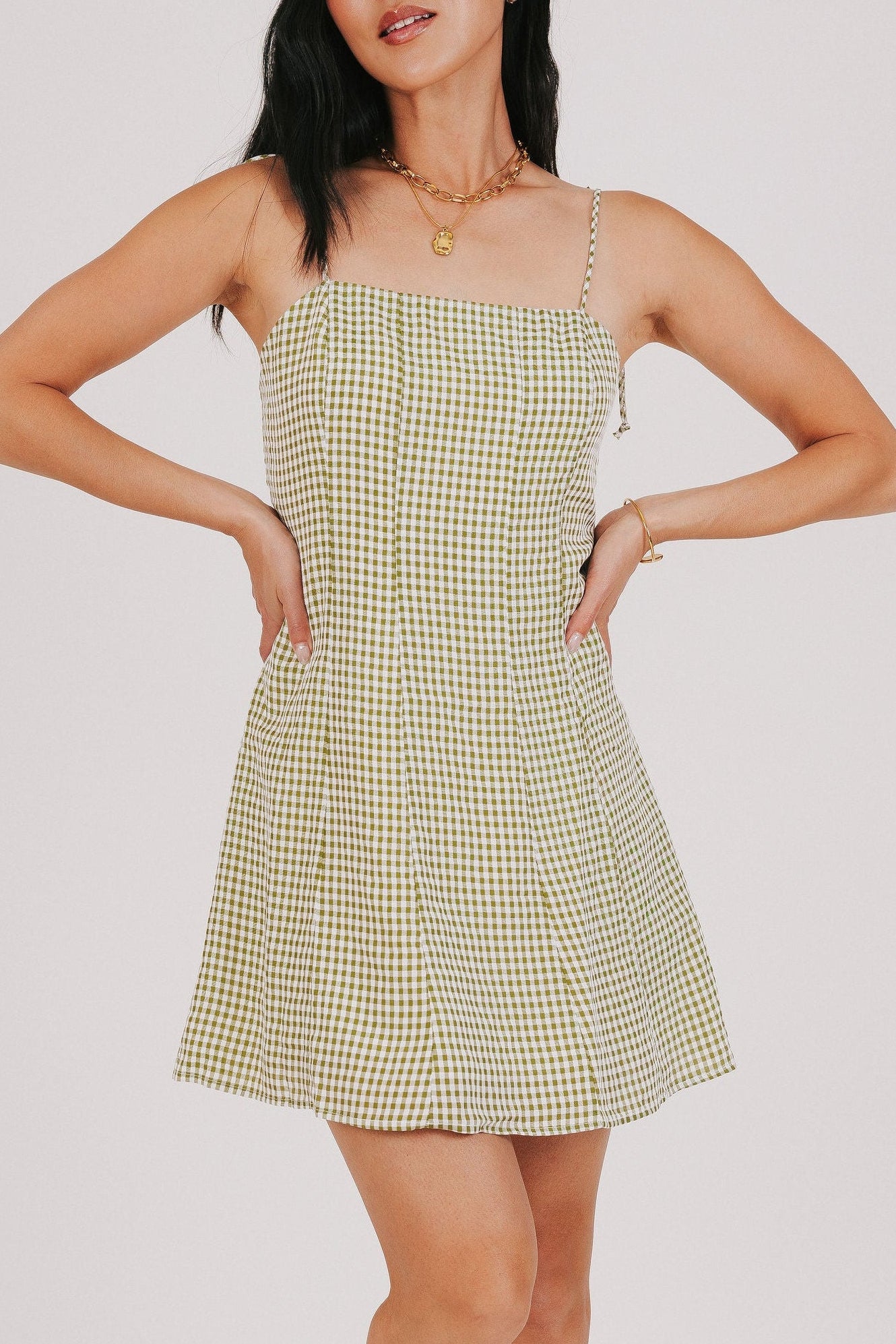 green and white gingham mini dress