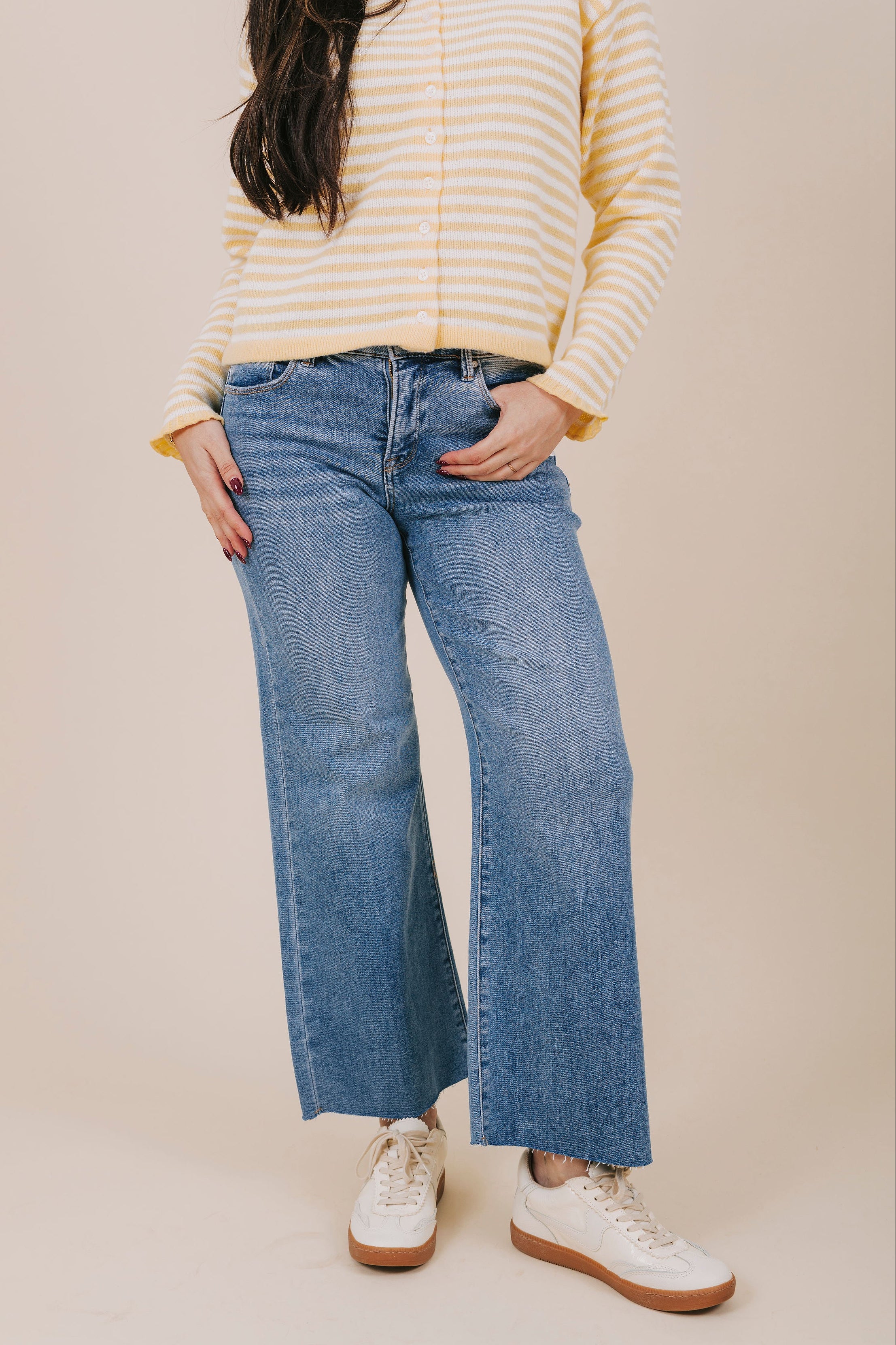 high waisted raw hem denim front
