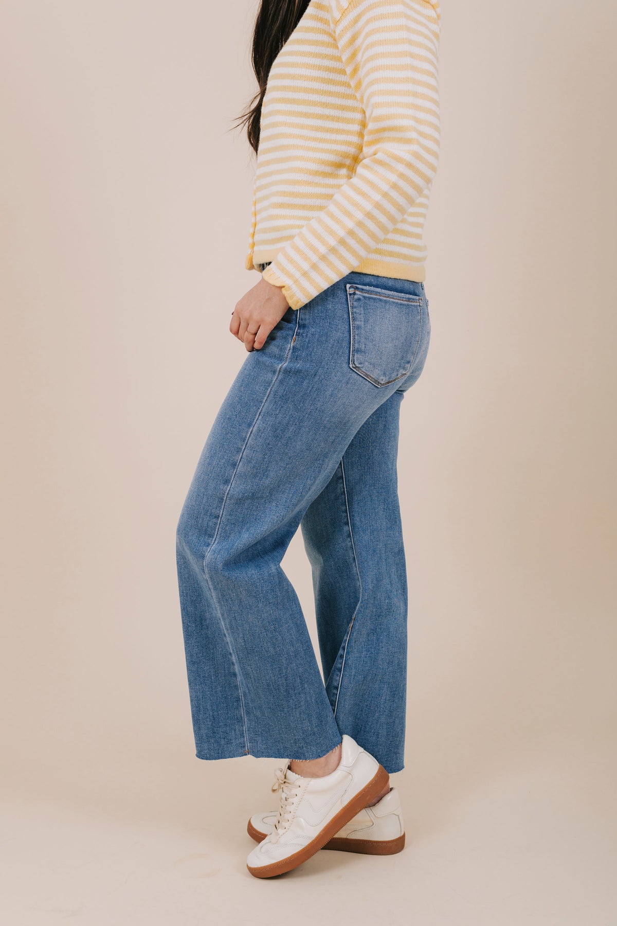high waisted raw hem denim side