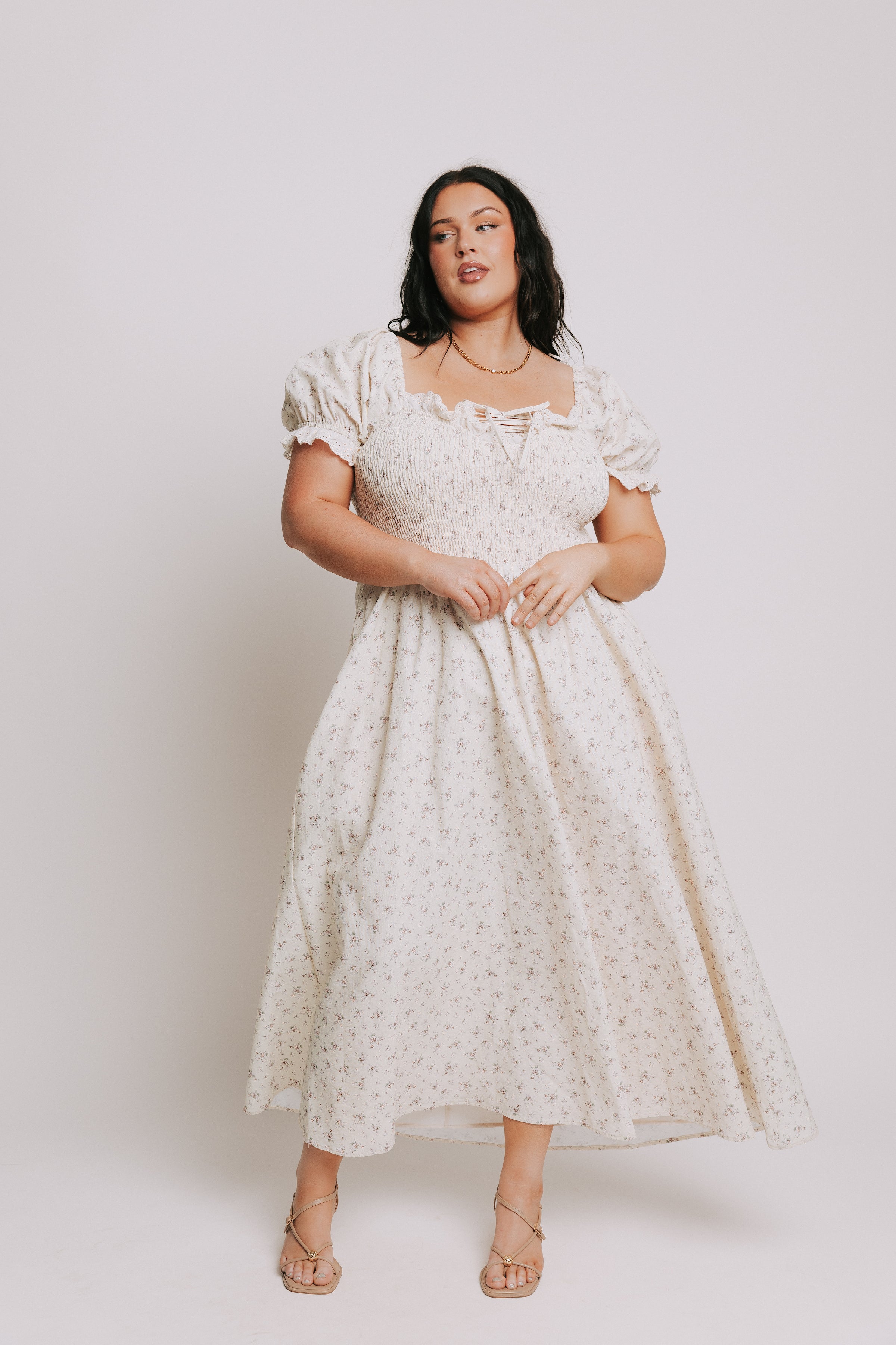 ivory floral dress with lace up detail and eyelet trim plus