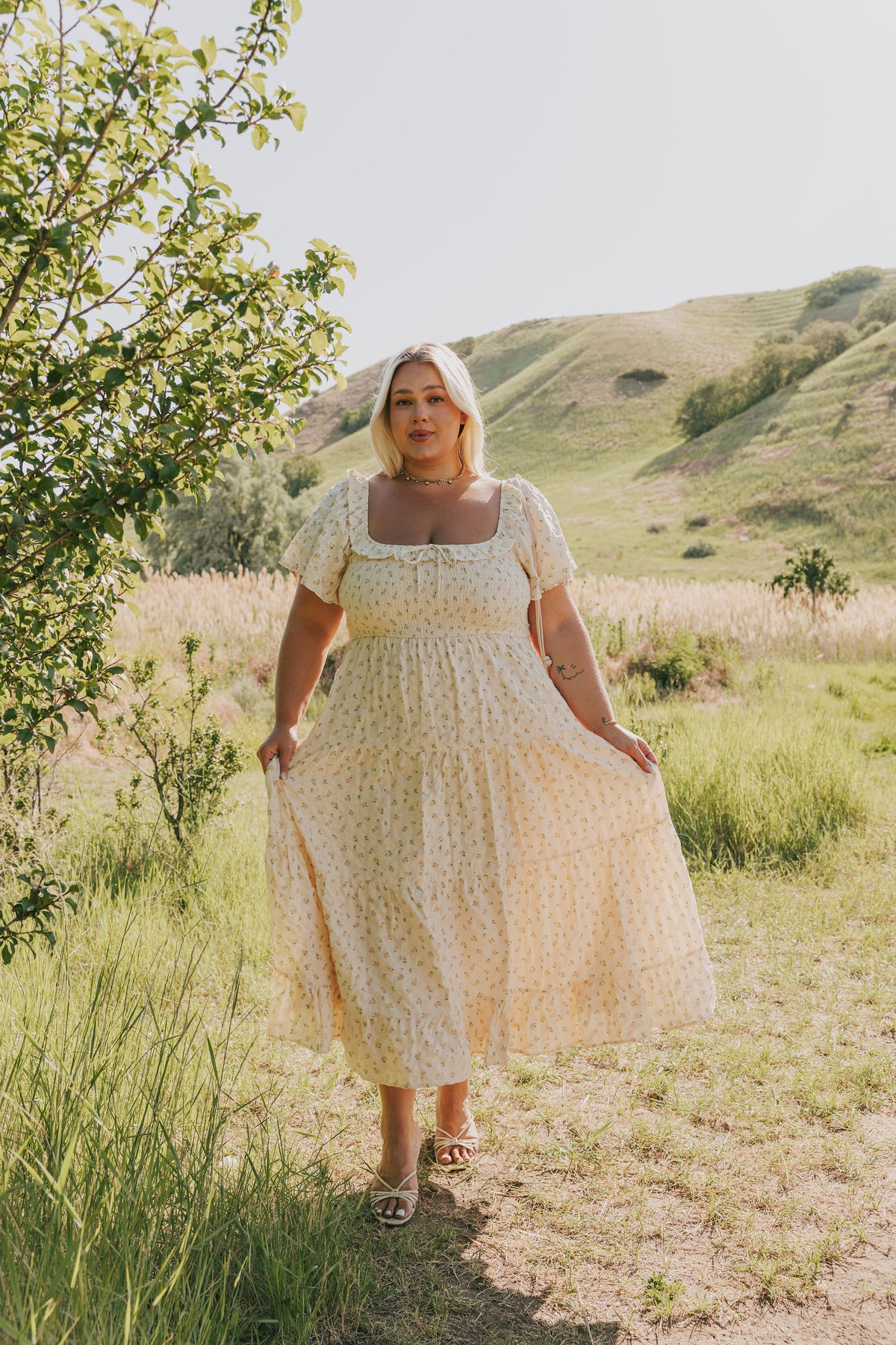 ivory tiered dress EXCLUSIVE global-description_tag-Vibrant bold and effortlessly eclectic the Alfie Dress is quintessentially RIXO. Designed with a flattering fitted waist panel long bohemian-style blouson sleeves and a floaty hemline it balances elegance with ease. Perfect for any