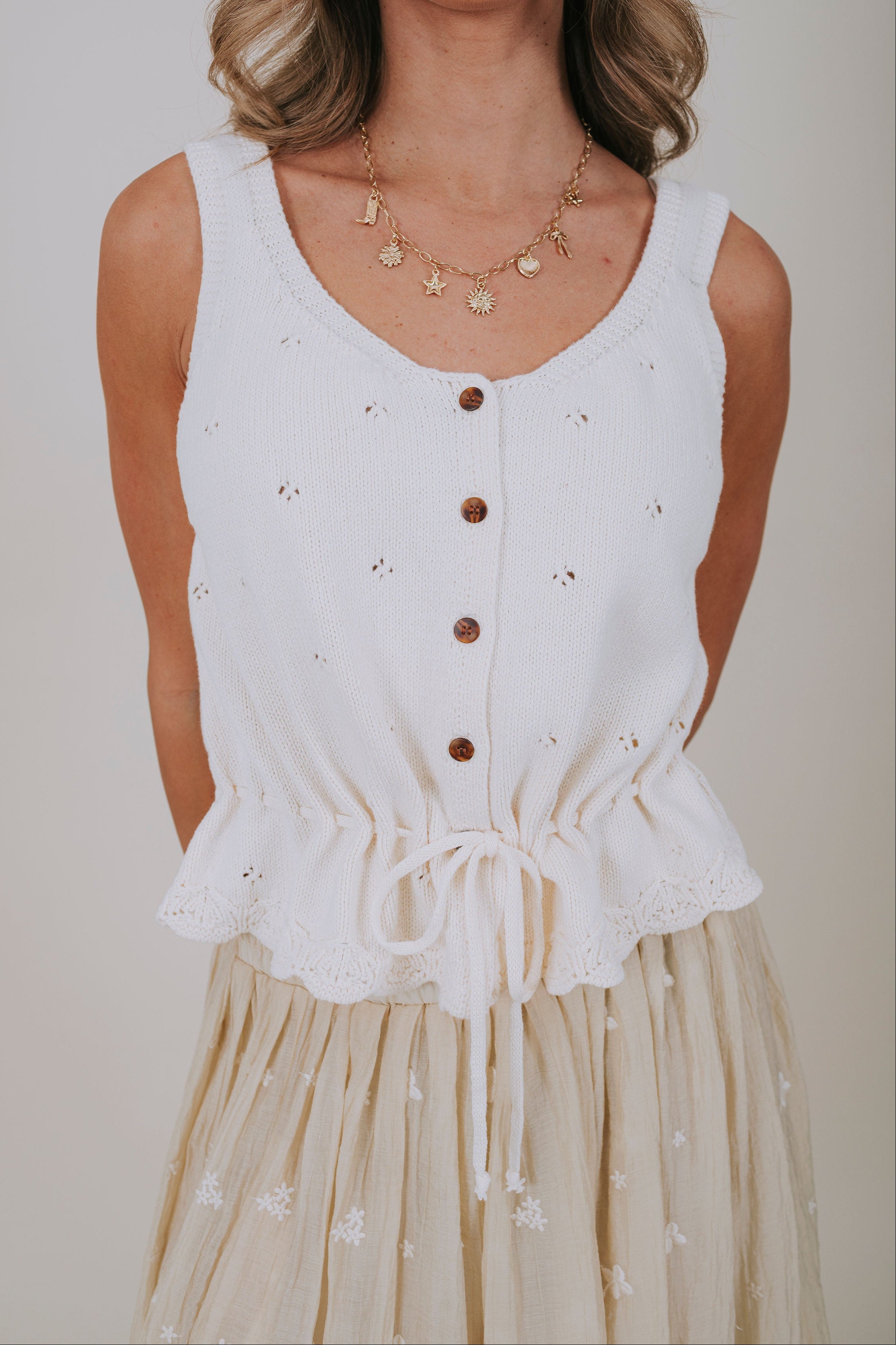 ivory pointelle drawstring top detail