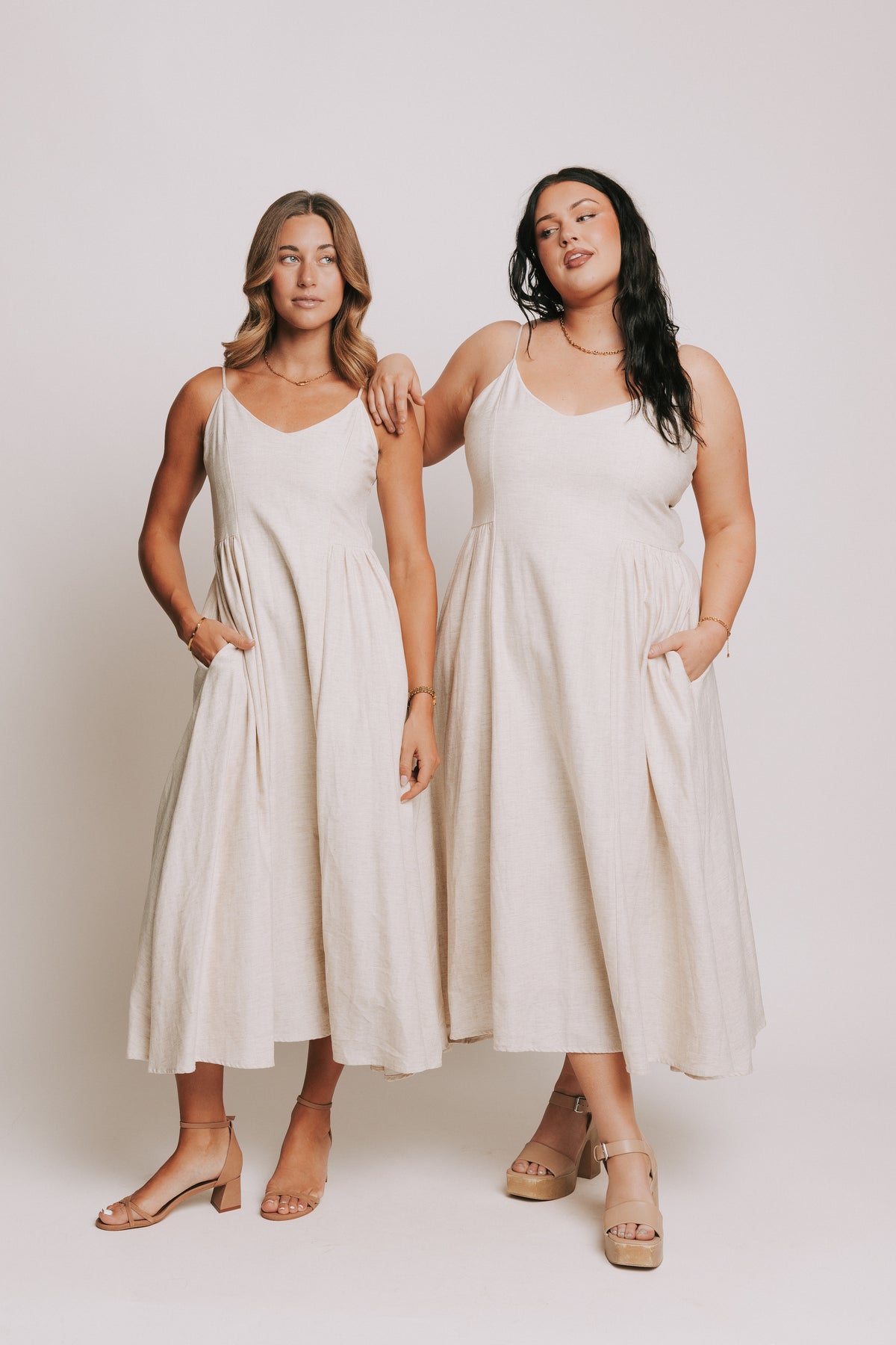 ivory spaghetti strap midi dress with sweetheart neckline models