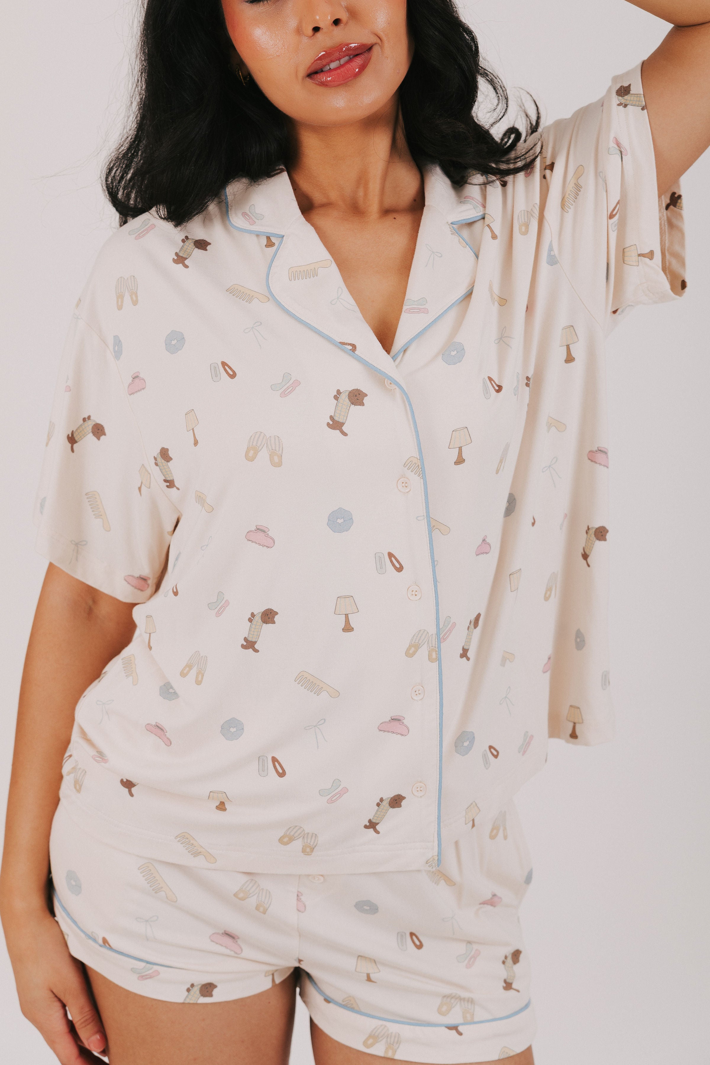 ivory top with buttons and fun print