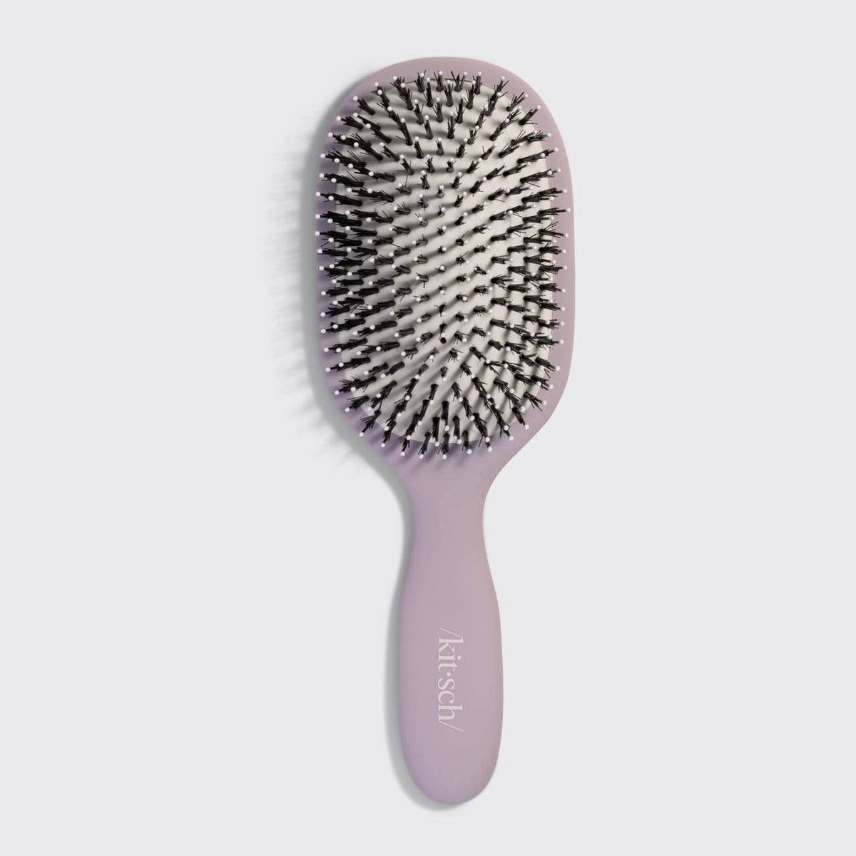 Kitsch recycled plastic shine boosting smooth and polish brush. For enhancing the hair's natural shine.