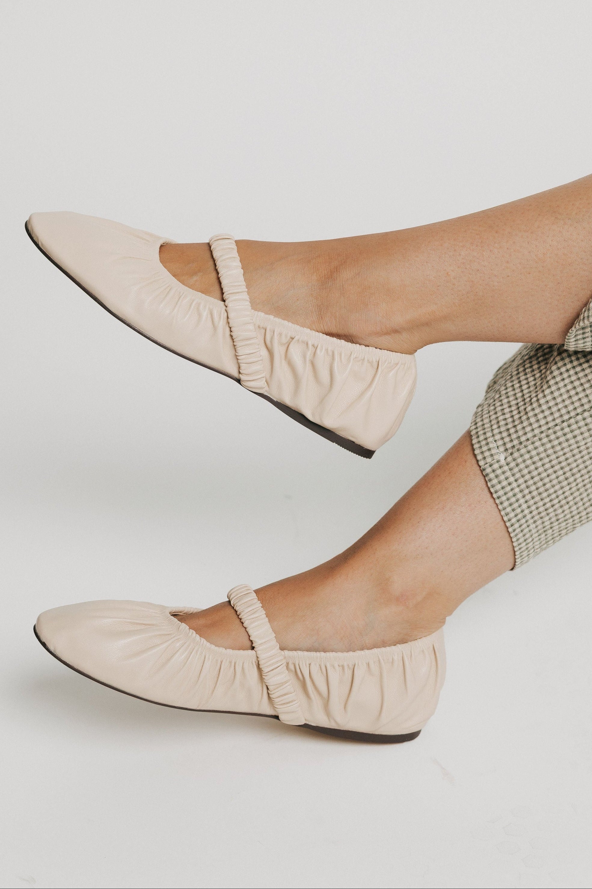 light beige leather flats with strap