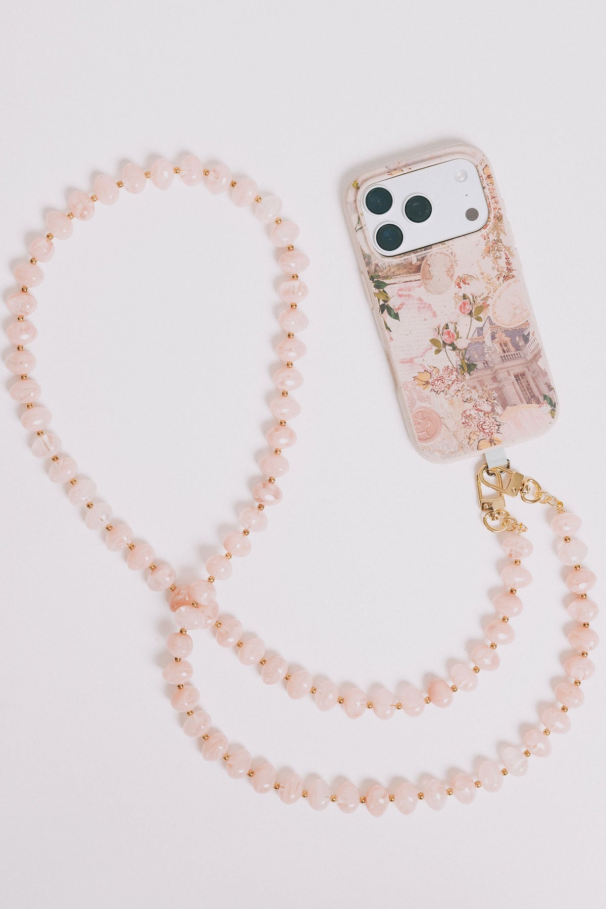love is around phone sling pink