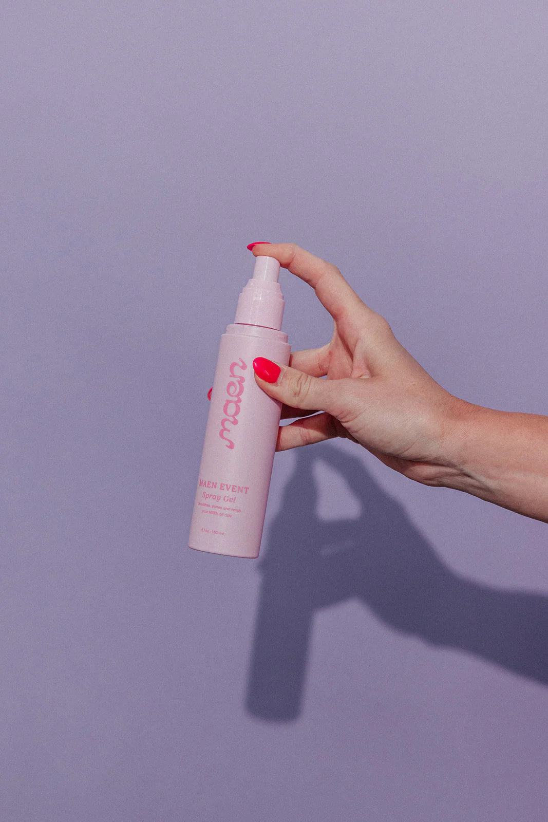 MAEN spray on gel for easy hair dos in a pink bottle 