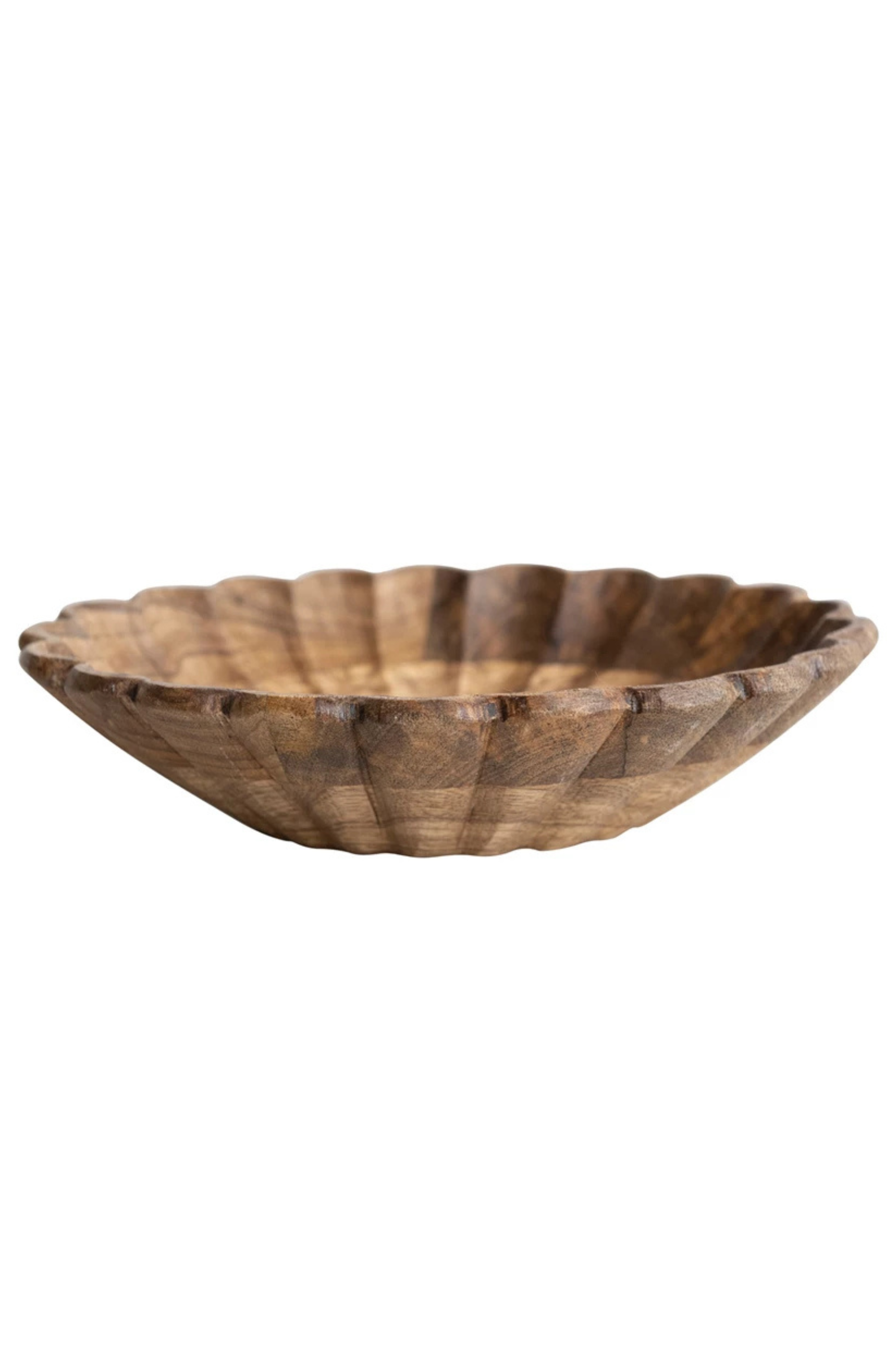 Wooden bowl with wavy edge on a white background