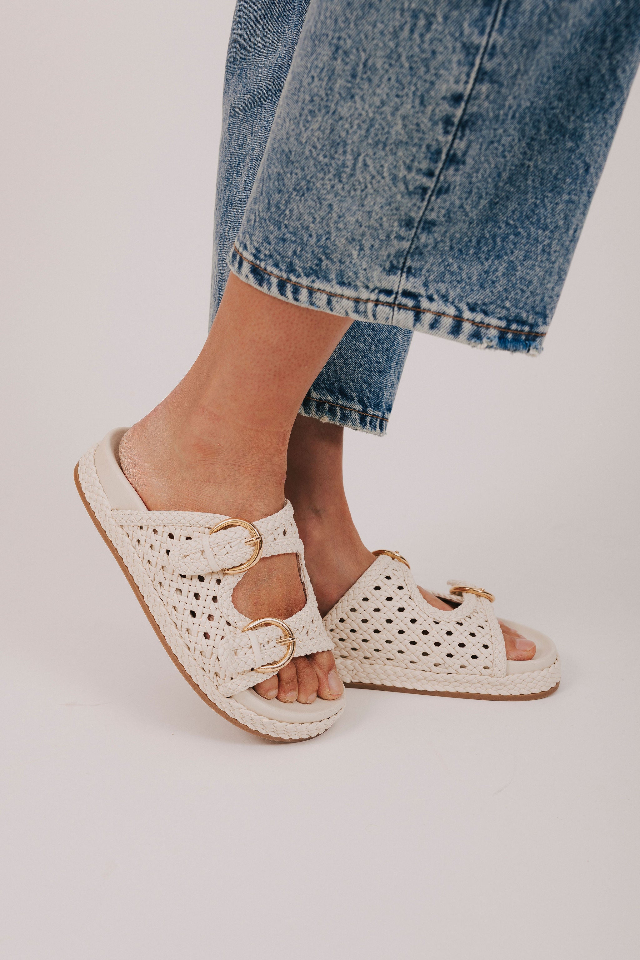 bone colored woven slide sandals gold buckles 